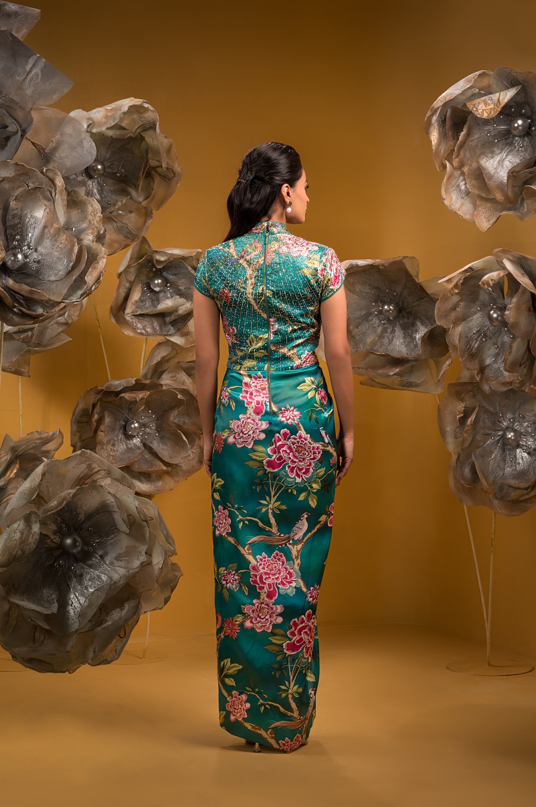A model showcasing Printed Long Drape Dress by Q By Sonia Baderia from Q By Sonia Baderia's collection