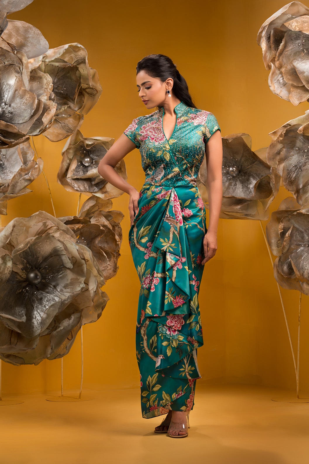 A model showcasing Printed Long Drape Dress by Q By Sonia Baderia from Q By Sonia Baderia's collection