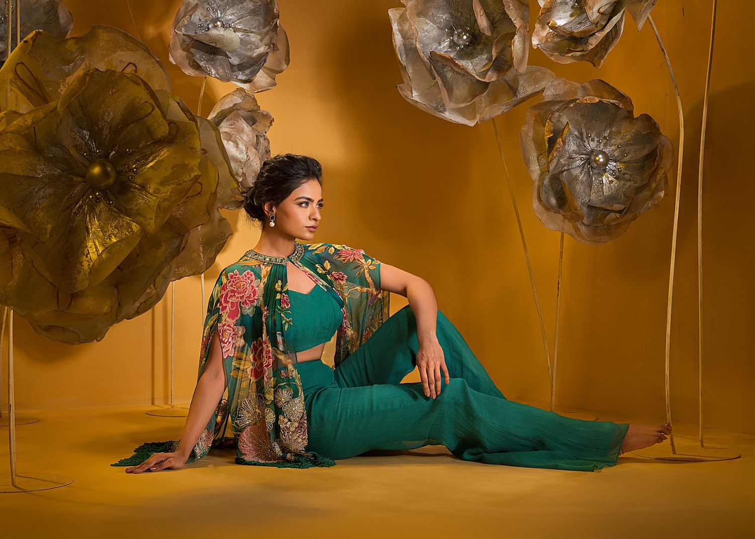 A model showcasing Printed Embroidered Cape And Flared Pant by Q By Sonia Baderia from Q By Sonia Baderia's collection