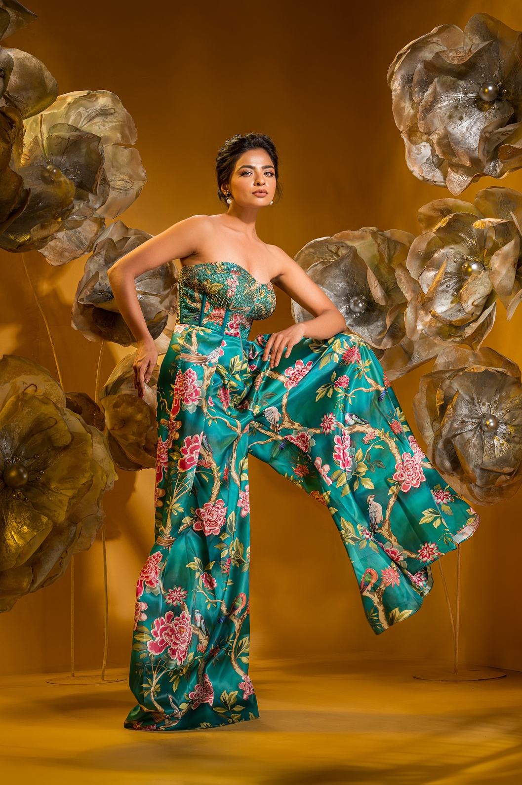A model showcasing Printed Taffeta Corset Jumpsuit Yoke Full Swarovski by Q By Sonia Baderia from Q By Sonia Baderia's collection