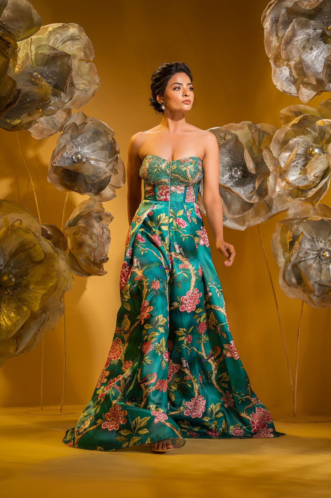 A model showcasing Printed Taffeta Corset Jumpsuit Yoke Full Swarovski by Q By Sonia Baderia from Q By Sonia Baderia's collection