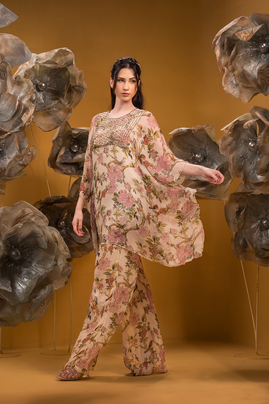 A model showcasing Printed Beige Kaftan Kurta With Flared Pant by Q By Sonia Baderia from Q By Sonia Baderia's collection