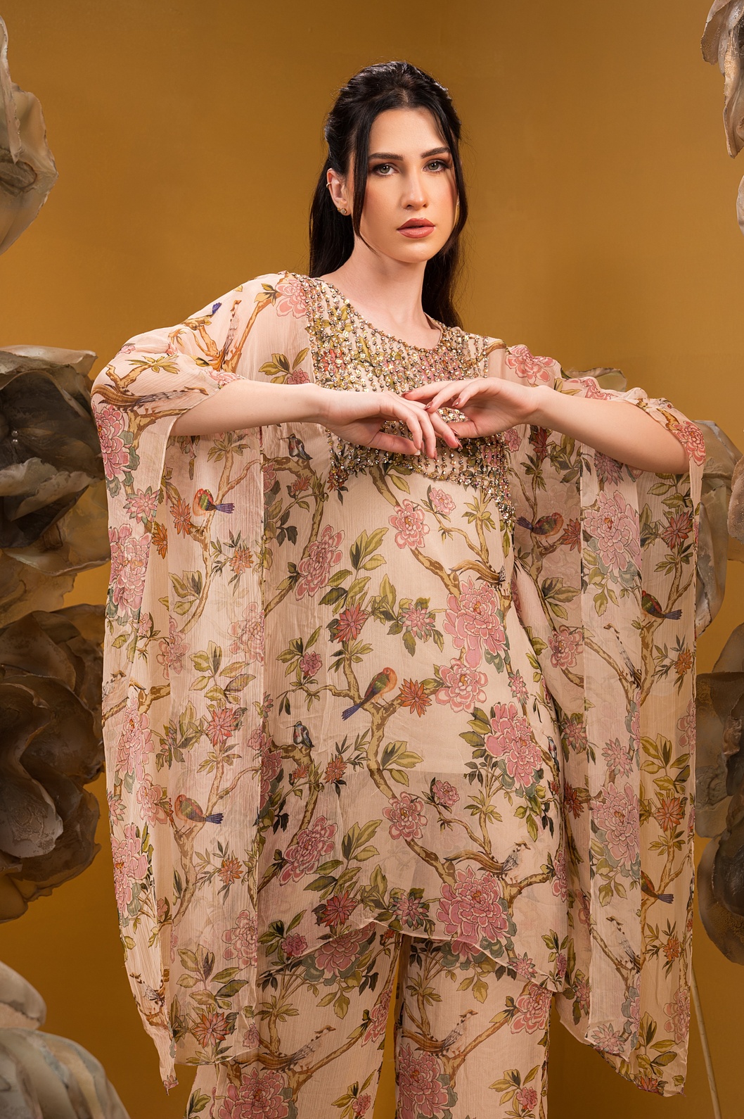 A model showcasing Printed Beige Kaftan Kurta With Flared Pant by Q By Sonia Baderia from Q By Sonia Baderia's collection
