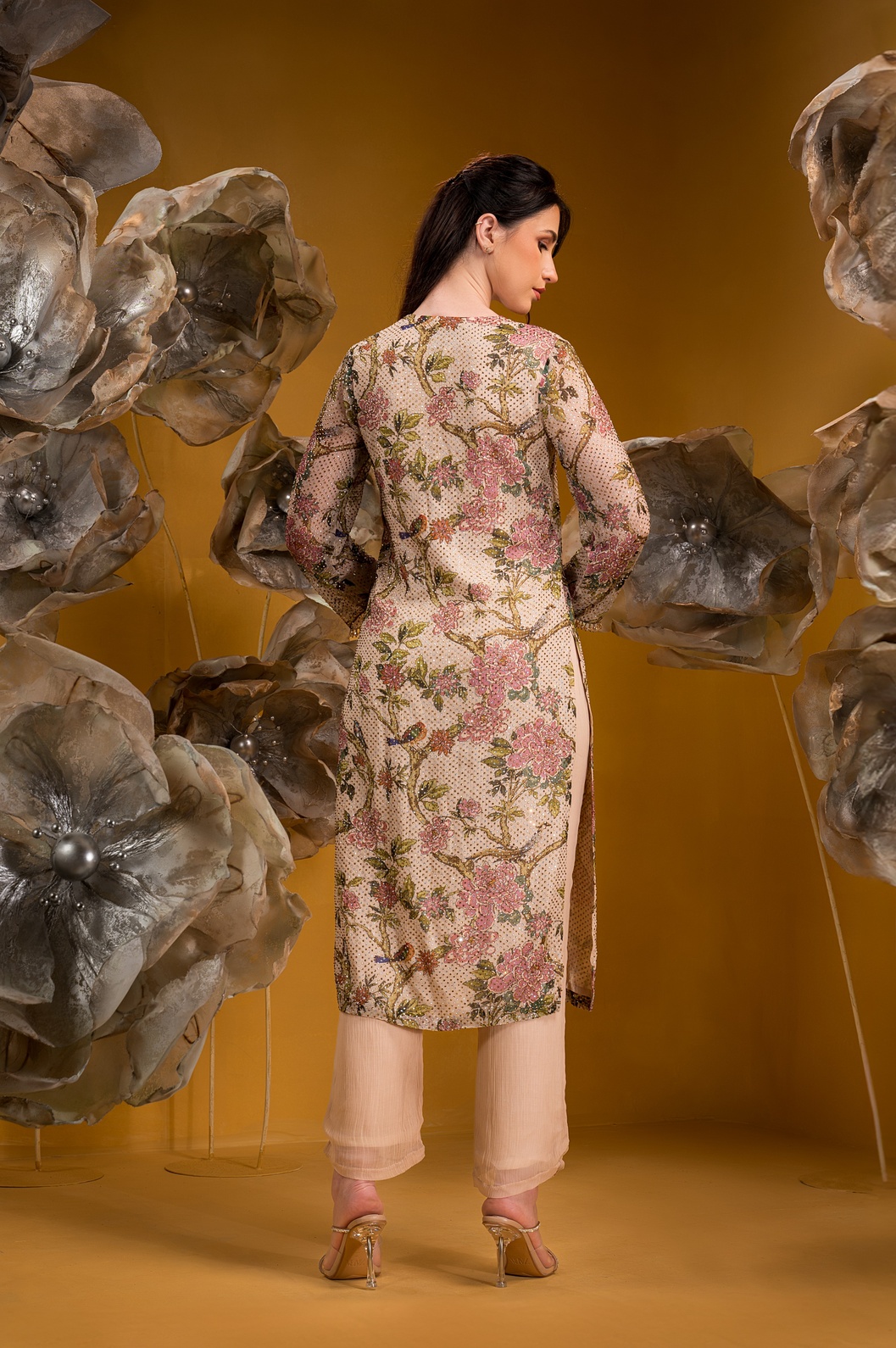 A model showcasing Printed Biege Long Kurta Set by Q By Sonia Baderia from Q By Sonia Baderia's collection
