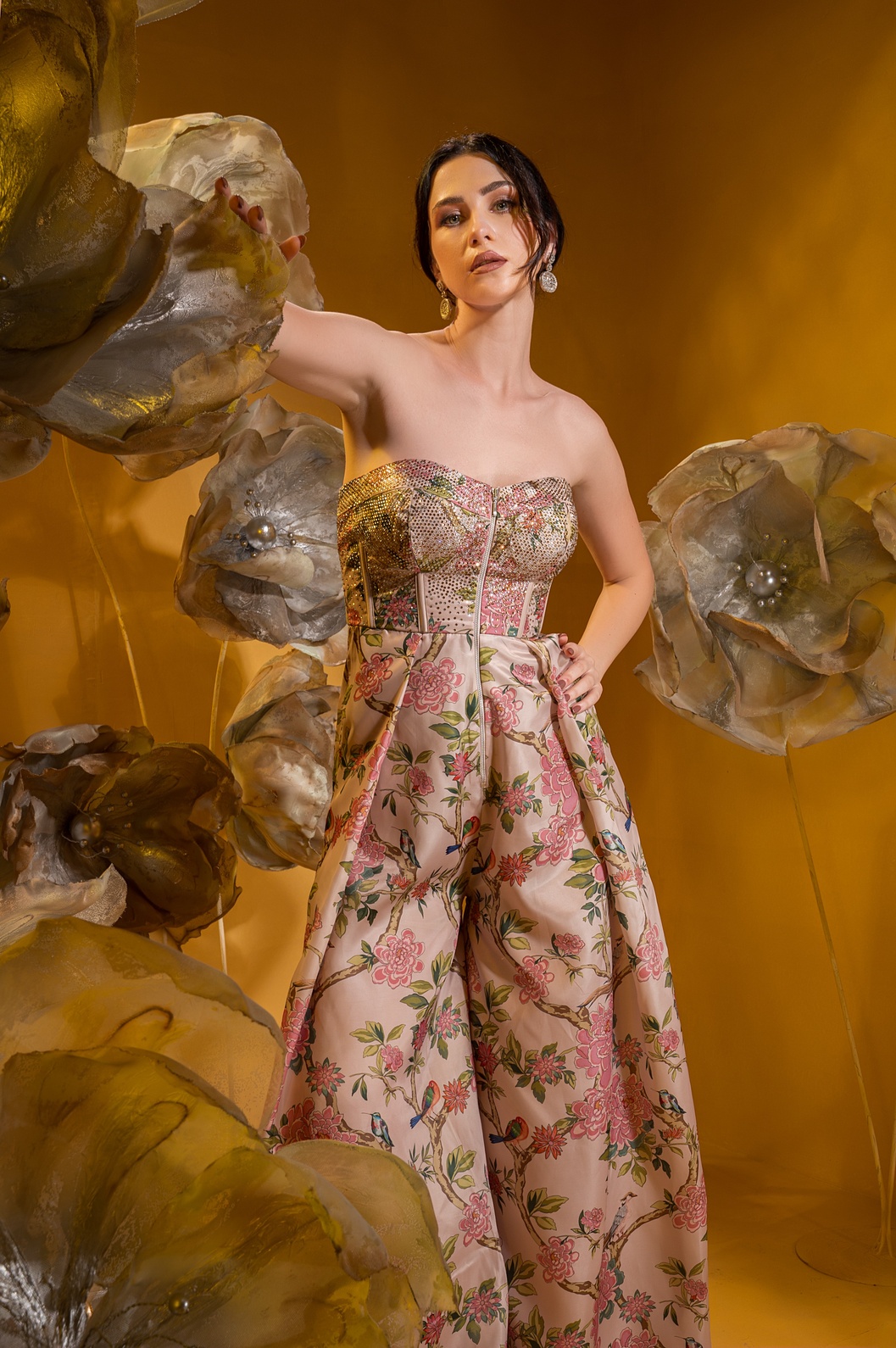 A model showcasing Printed Biege Corset Jumpsuit by Q By Sonia Baderia from Q By Sonia Baderia's collection