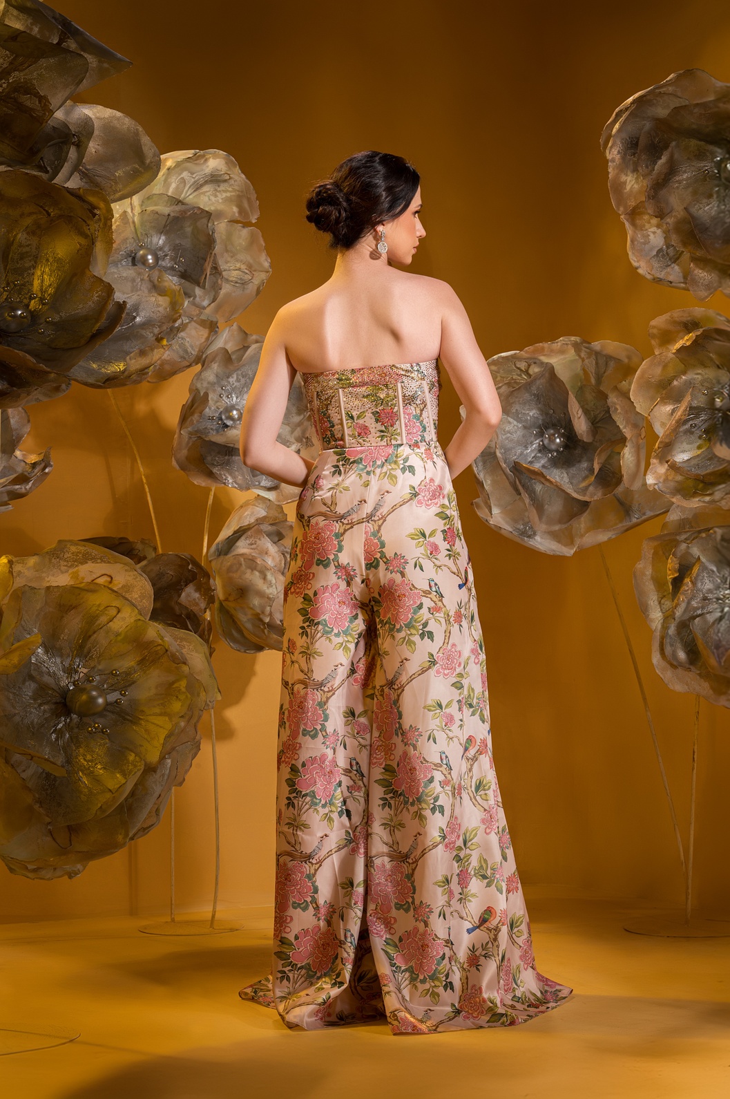 A model showcasing Printed Biege Corset Jumpsuit by Q By Sonia Baderia from Q By Sonia Baderia's collection