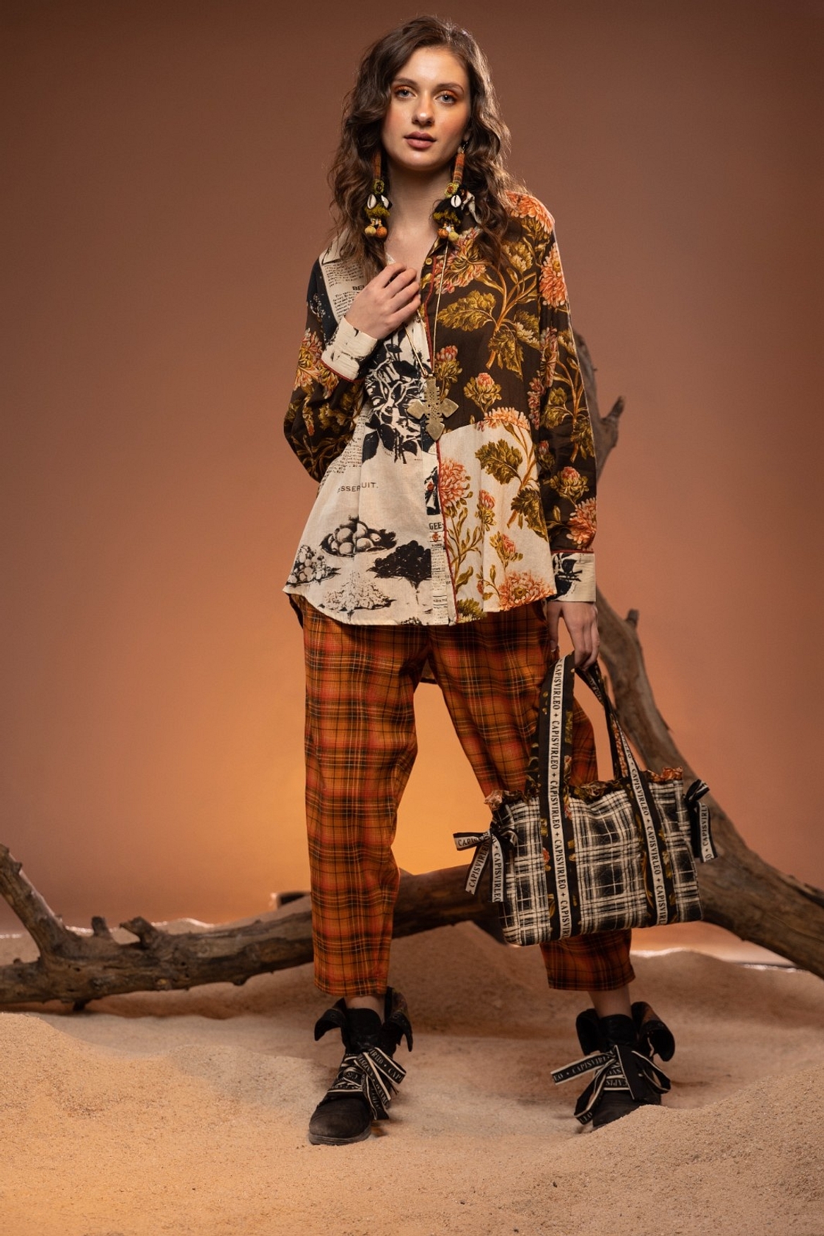 A model showcasing Orange Black Check Pants Feature image by Capisvirleo from Capisvirleo's collection