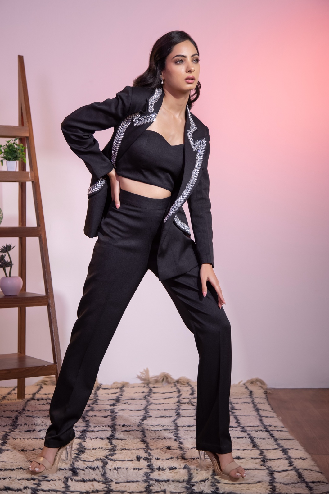A model showcasing Black Swaroski Blazer Pant by Kanika Verma Couture from Kanika Verma Couture's collection