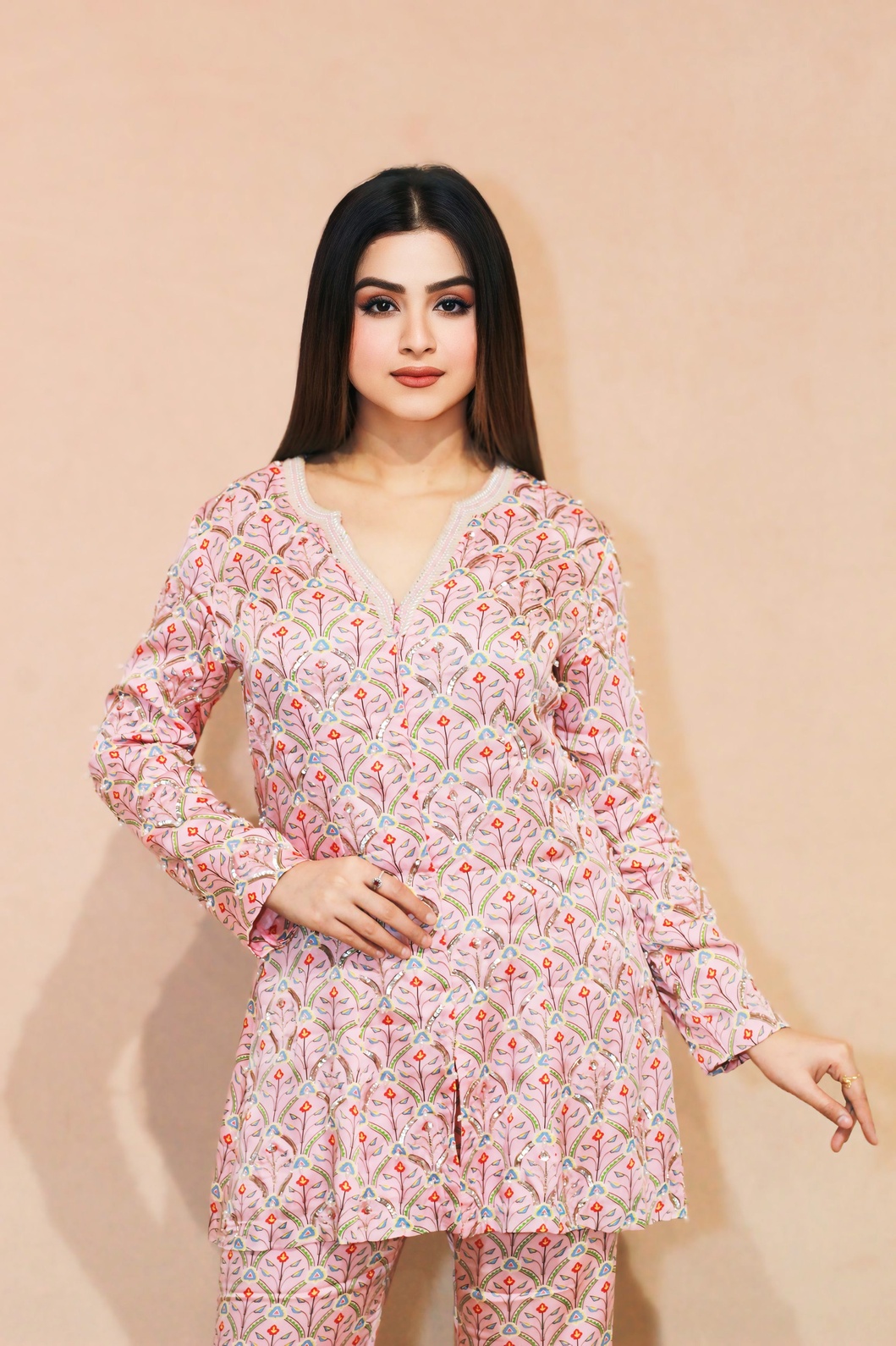 A model showcasing Kumud Shortjacket B Btm by Kanika Verma Couture from Kanika Verma Couture's collection A model showcasing Kumud Shortjacket B Btm by Kanika Verma Couture from Kanika Verma Couture's collection