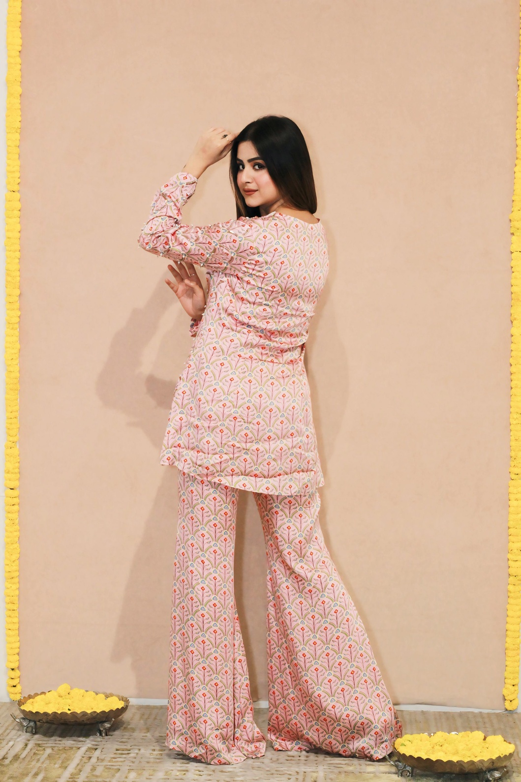 A model showcasing Kumud Shortjacket B Btm by Kanika Verma Couture from Kanika Verma Couture's collection A model showcasing Kumud Shortjacket B Btm by Kanika Verma Couture from Kanika Verma Couture's collection