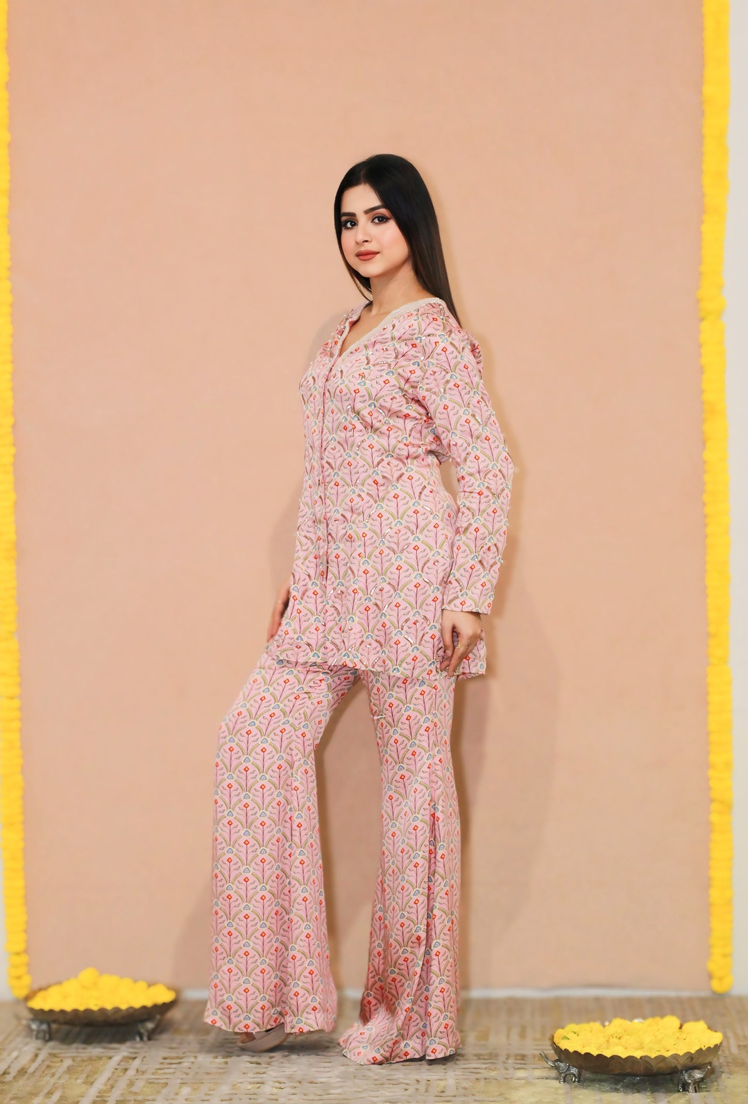 A model showcasing Kumud Shortjacket B Btm by Kanika Verma Couture from Kanika Verma Couture's collection A model showcasing Kumud Shortjacket B Btm by Kanika Verma Couture from Kanika Verma Couture's collection