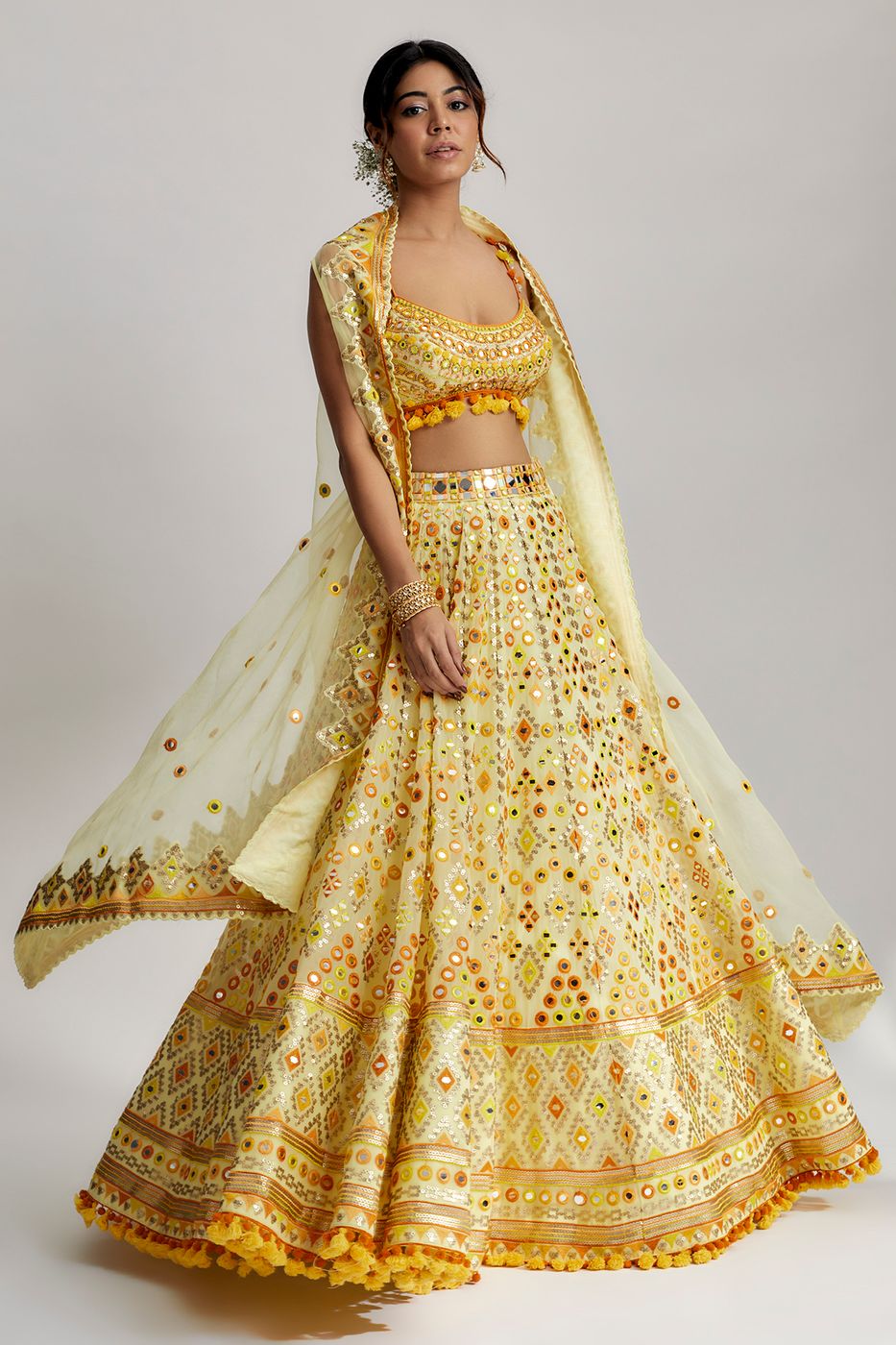 A model showcasing Yellow Ashi Lehenga With Cape Set Feature image by Gopi Vaid from Gopi Vaid's collection