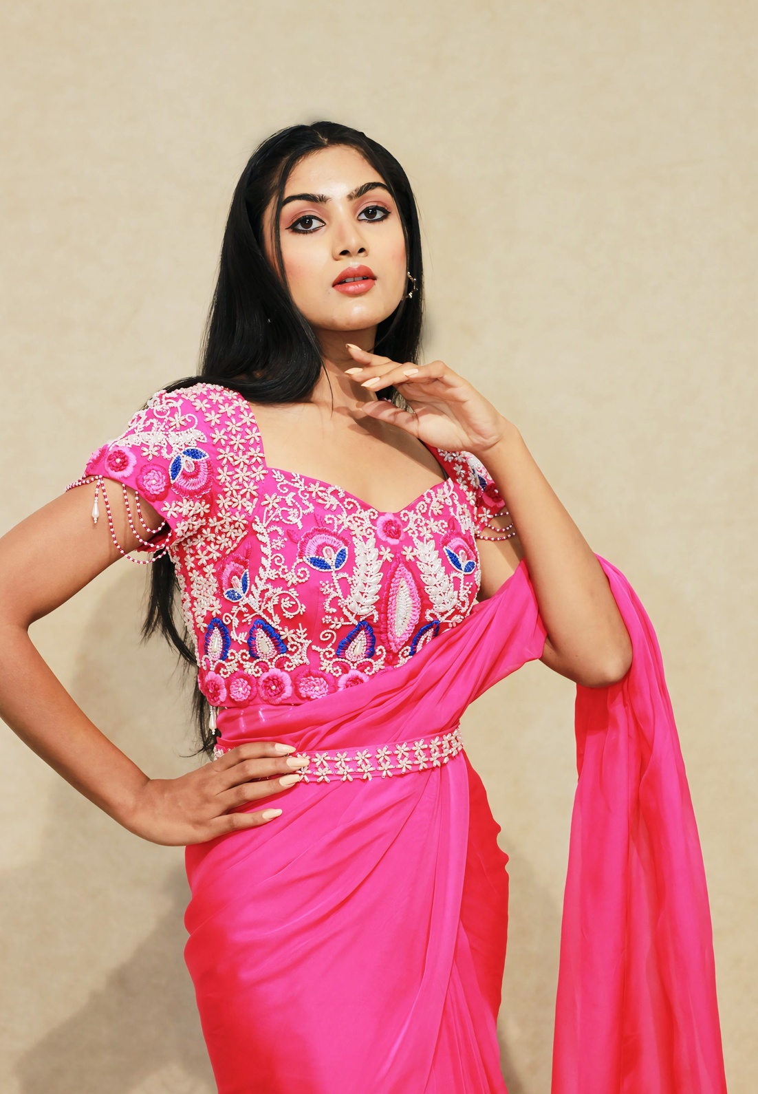 A model showcasing Rangoli Pink Drape Saree by Kanika Verma Couture from Kanika Verma Couture's collection