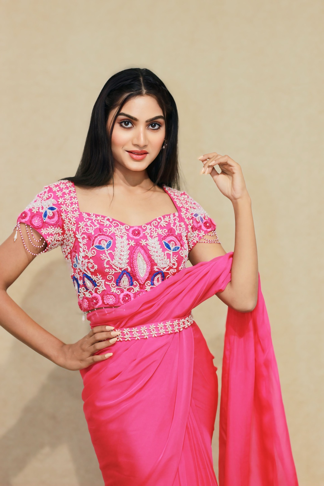A model showcasing Rangoli Pink Drape Saree by Kanika Verma Couture from Kanika Verma Couture's collection