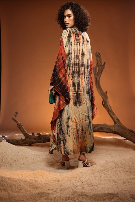 A model showcasing Beige Danta Kaftan by Capisvirleo from Capisvirleo's collection