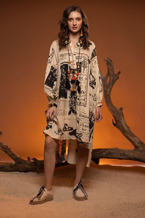 A model showcasing Ivory Black Alder Dress by Capisvirleo from Capisvirleo's collection