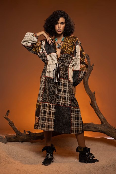 A model showcasing Ivory Black Willow Jacket by Capisvirleo from Capisvirleo's collection