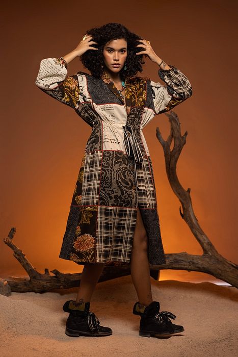 A model showcasing Ivory Black Willow Jacket by Capisvirleo from Capisvirleo's collection