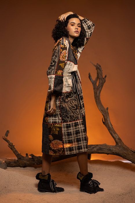 A model showcasing Ivory Black Willow Jacket by Capisvirleo from Capisvirleo's collection