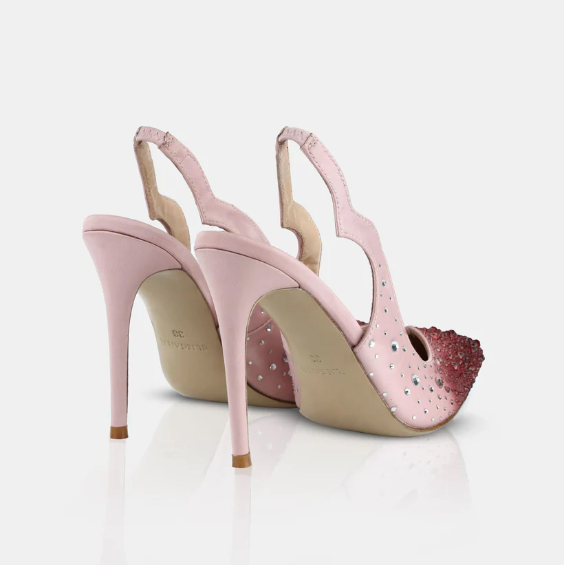 A model showcasing Embellished Pointed Toe Sling Back Pumps by Elleganti from Elleganti's collection A model showcasing Embellished Pointed Toe Sling Back Pumps by Elleganti from Elleganti's collection