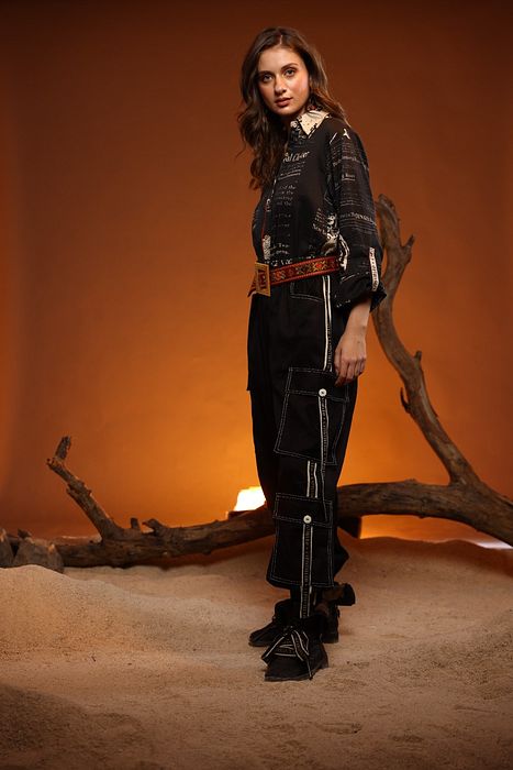 A model showcasing Black CYPRESS Shirt by Capisvirleo from Capisvirleo's collection