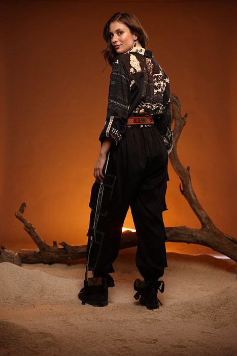 A model showcasing Black CYPRESS Shirt by Capisvirleo from Capisvirleo's collection