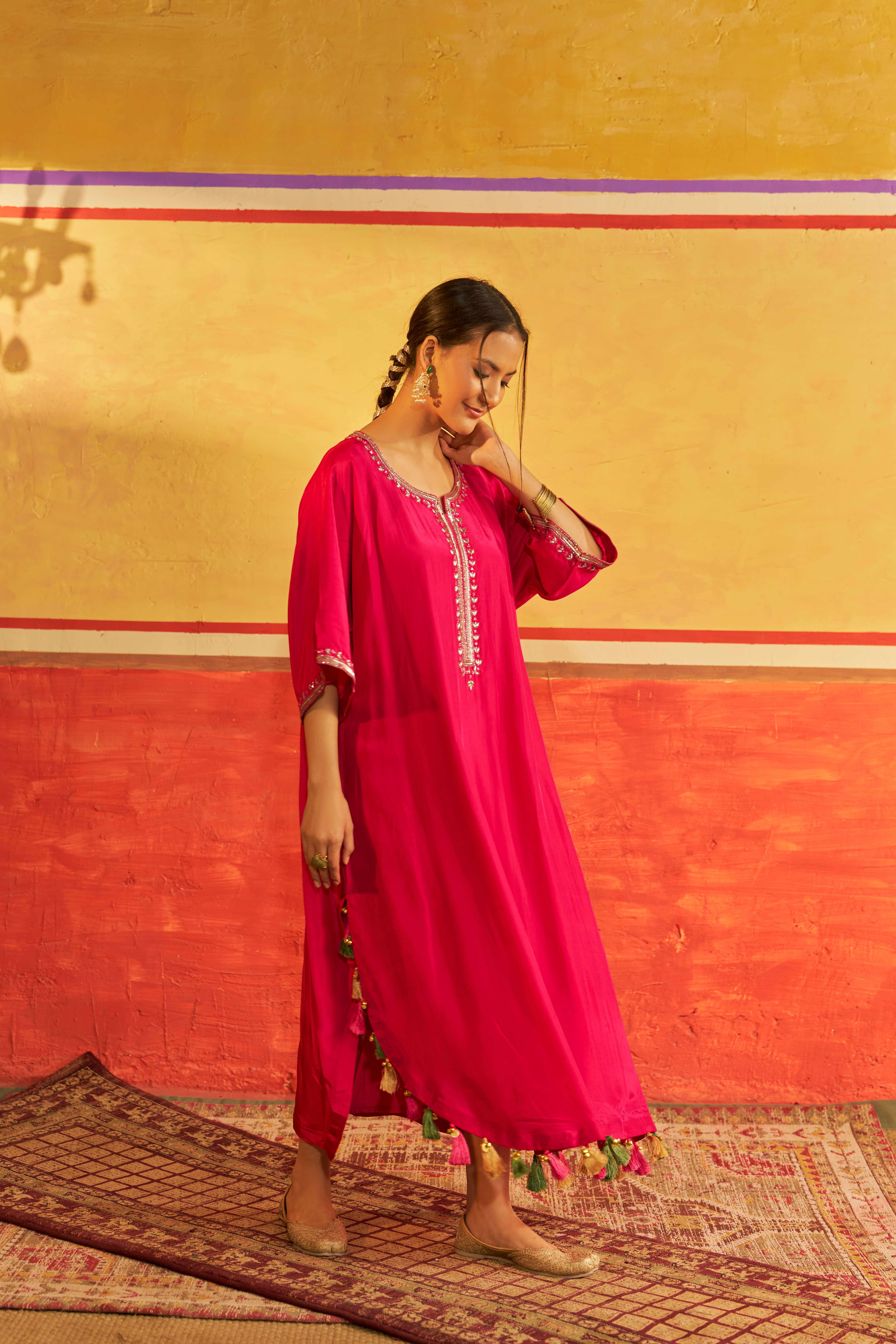 A model showcasing Chashni Pink Kaftan by Gaamya from Gaamya's collection