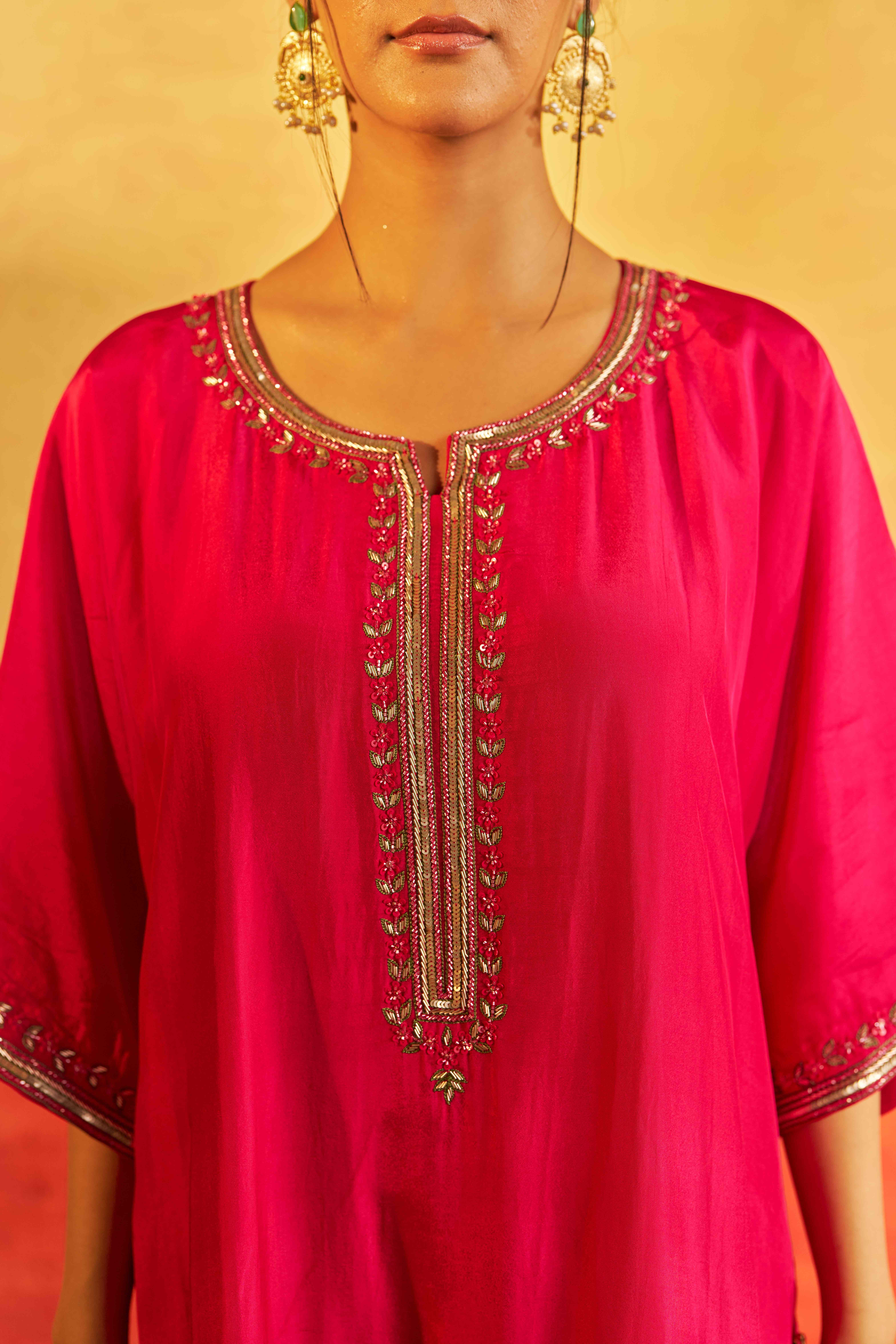 A model showcasing Chashni Pink Kaftan by Gaamya from Gaamya's collection