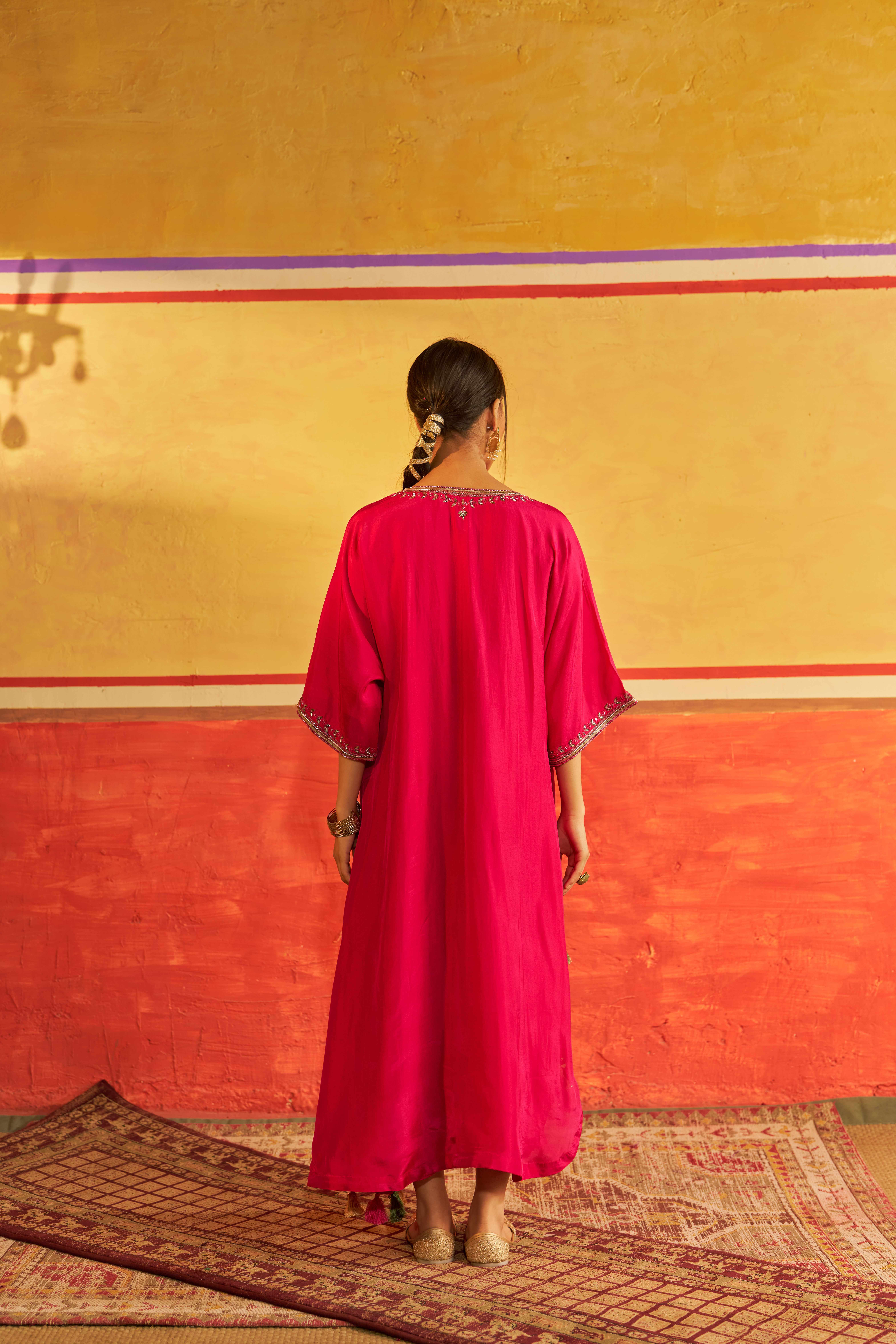 A model showcasing Chashni Pink Kaftan by Gaamya from Gaamya's collection