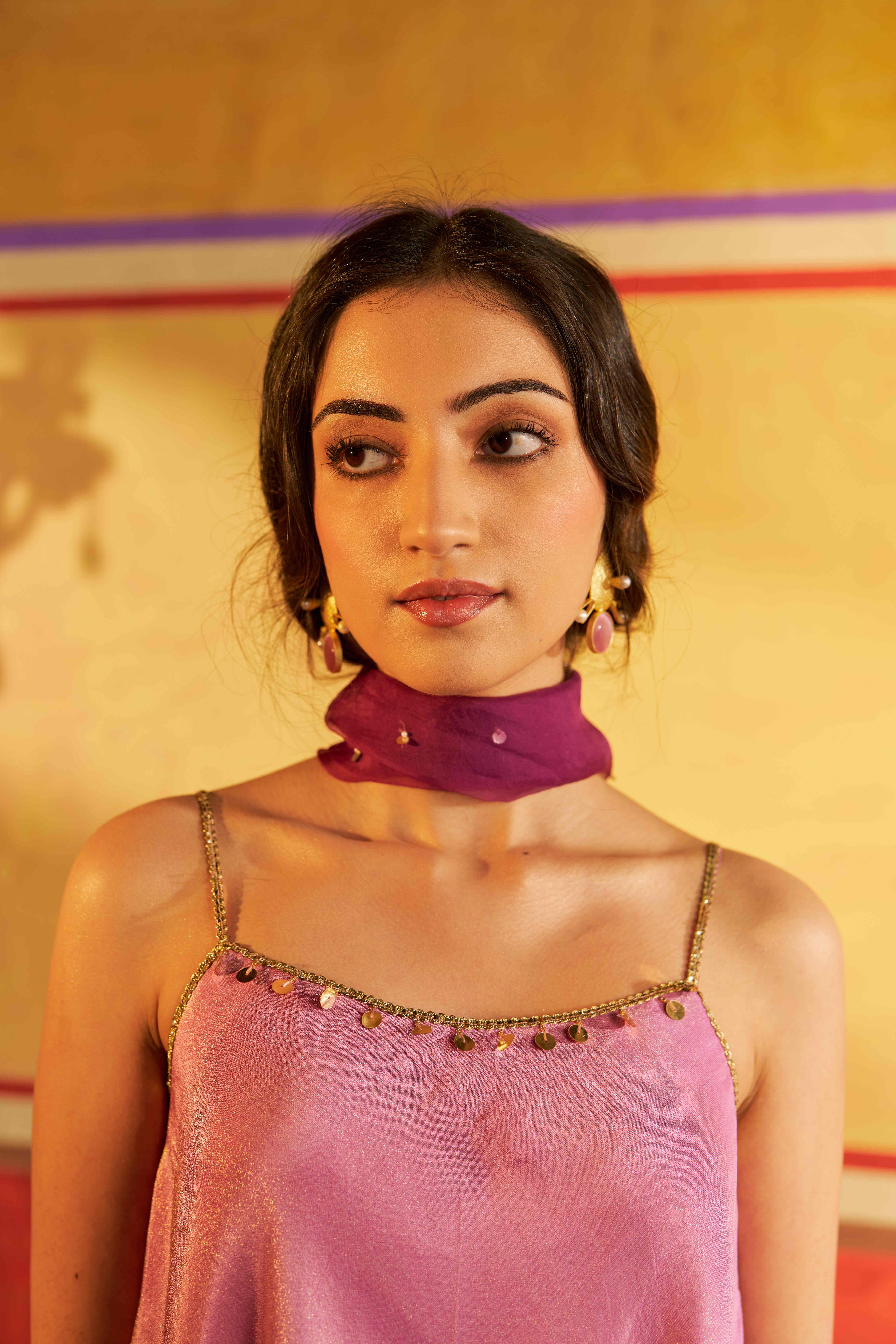 A model showcasing Sangam Lavender Sharara Set by Gaamya from Gaamya's collection