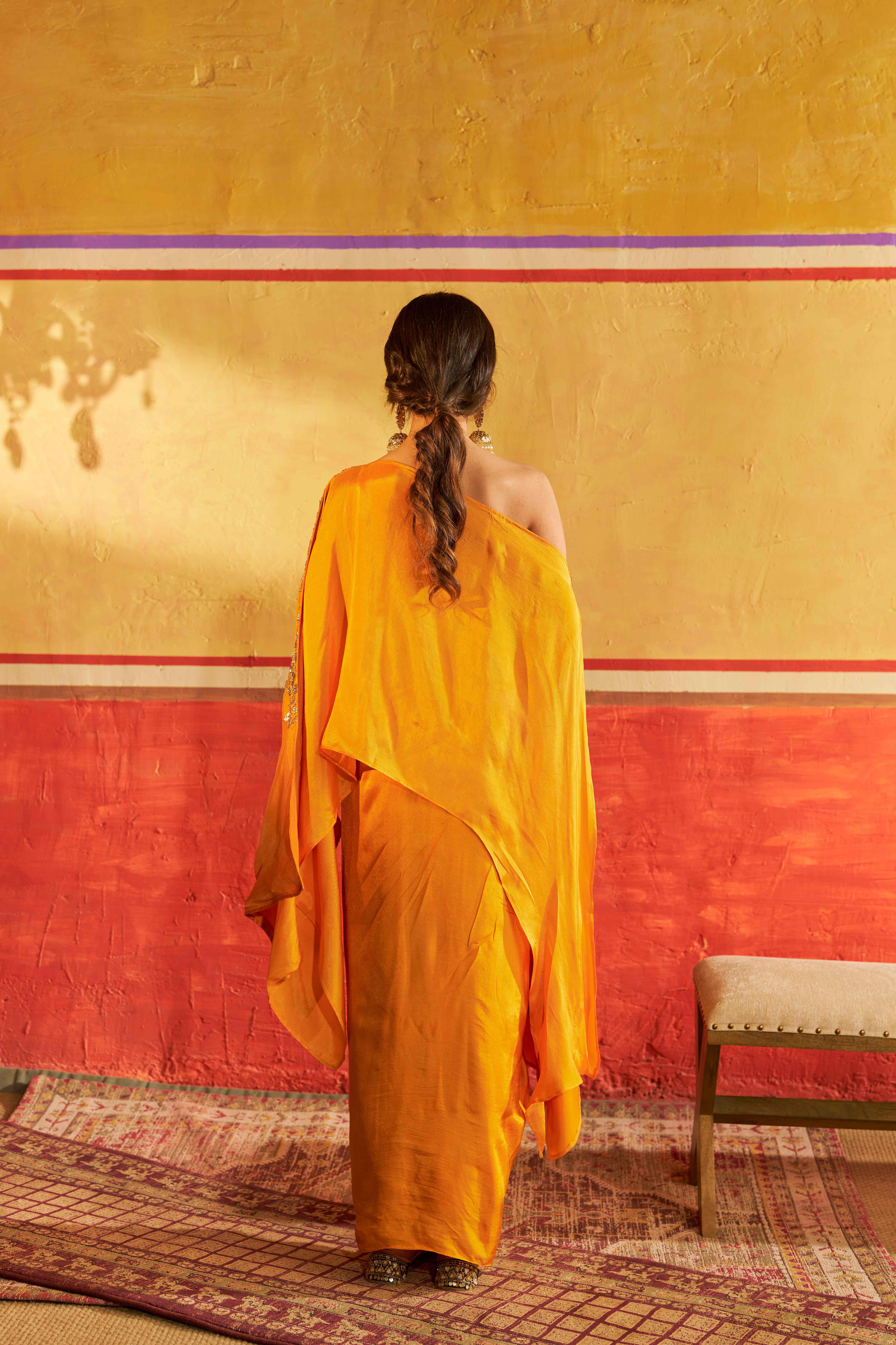 A model showcasing Sitara Yellow Kaftan Set by Gaamya from Gaamya's collection