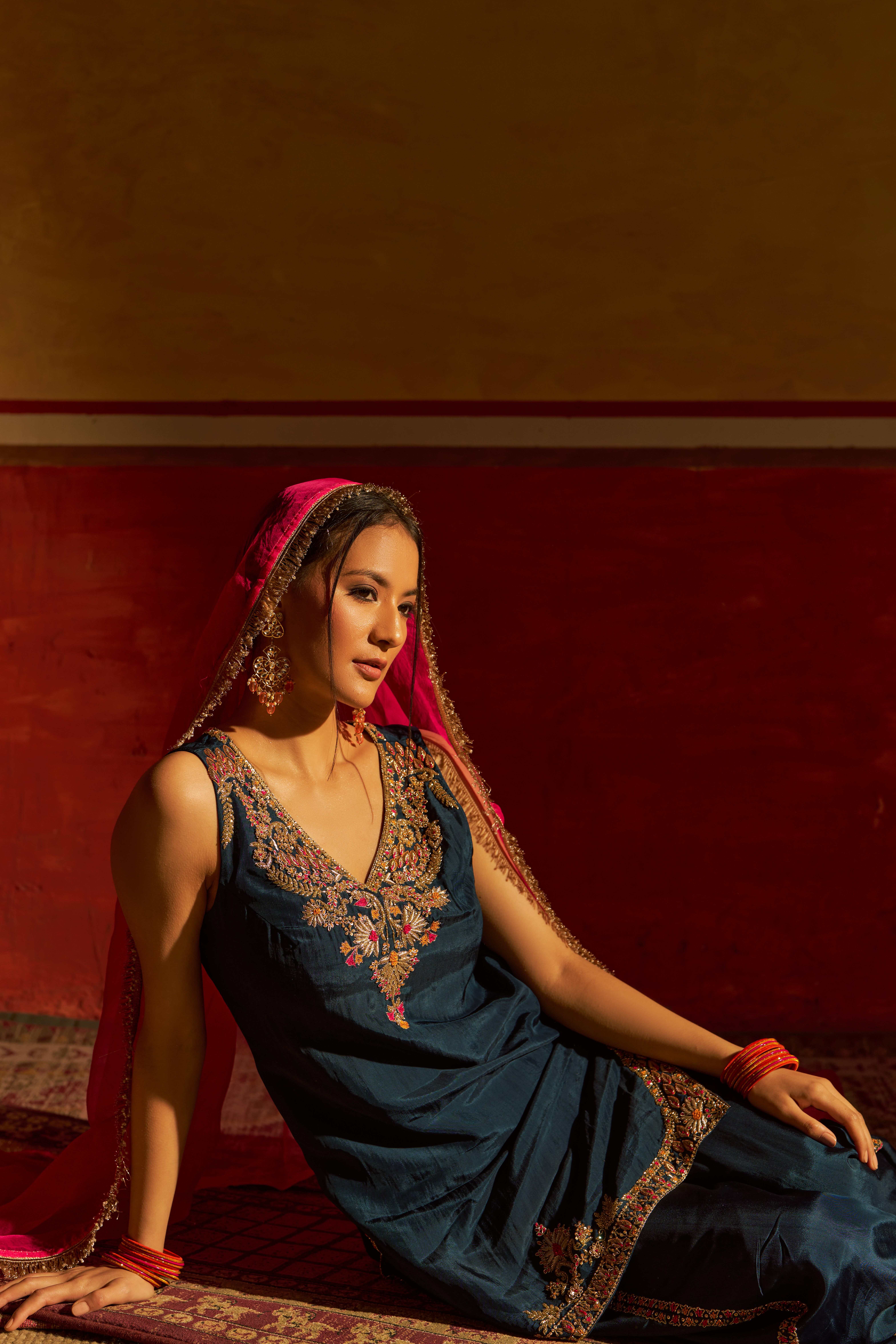 A model showcasing Saaz Navy Blue Sharara With Dupatta by Gaamya from Gaamya's collection