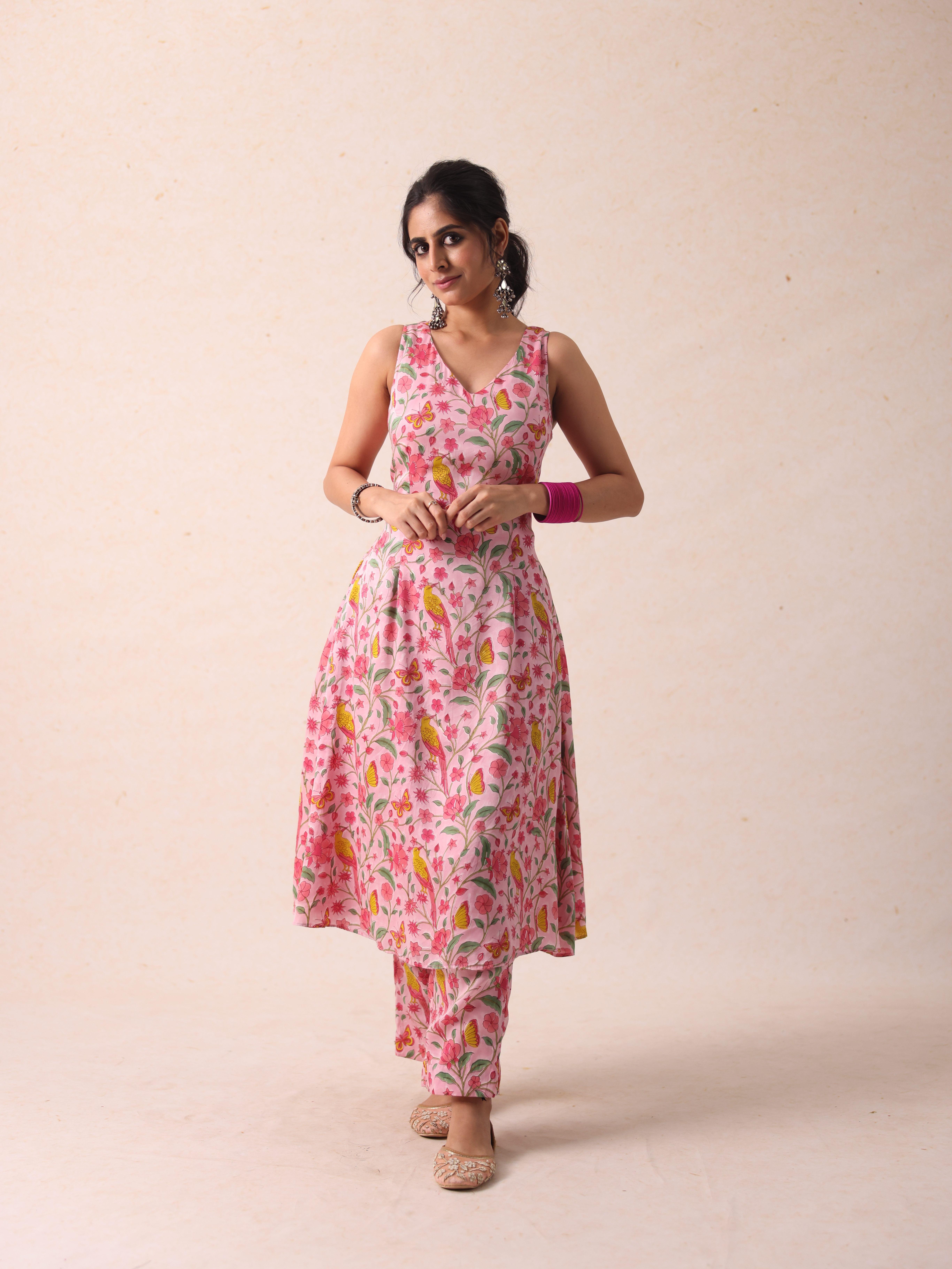 A model showcasing Shelly Pink Kurta Set by Gaamya from Gaamya's collection