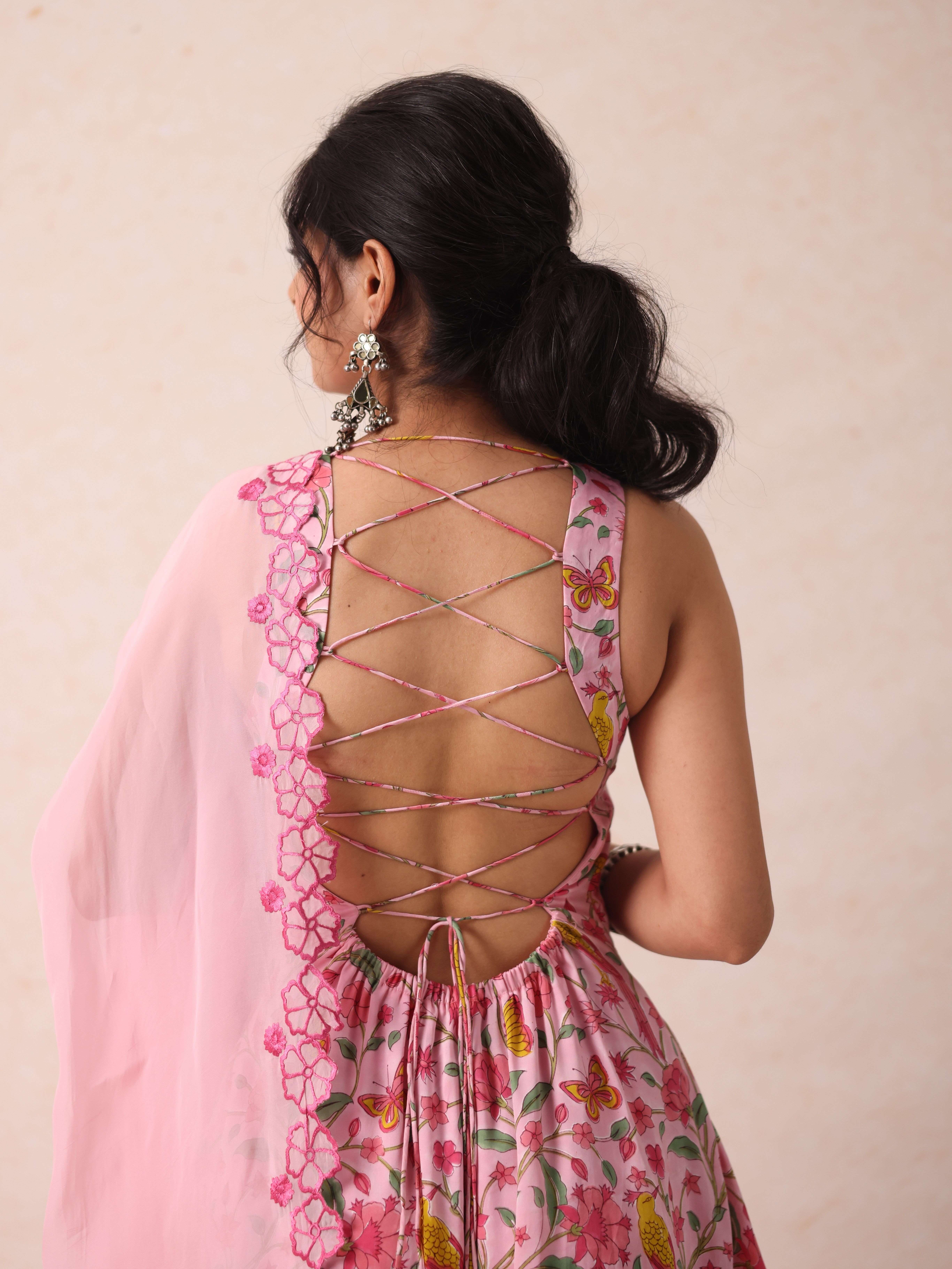 A model showcasing Shelly Pink Kurta Set by Gaamya from Gaamya's collection