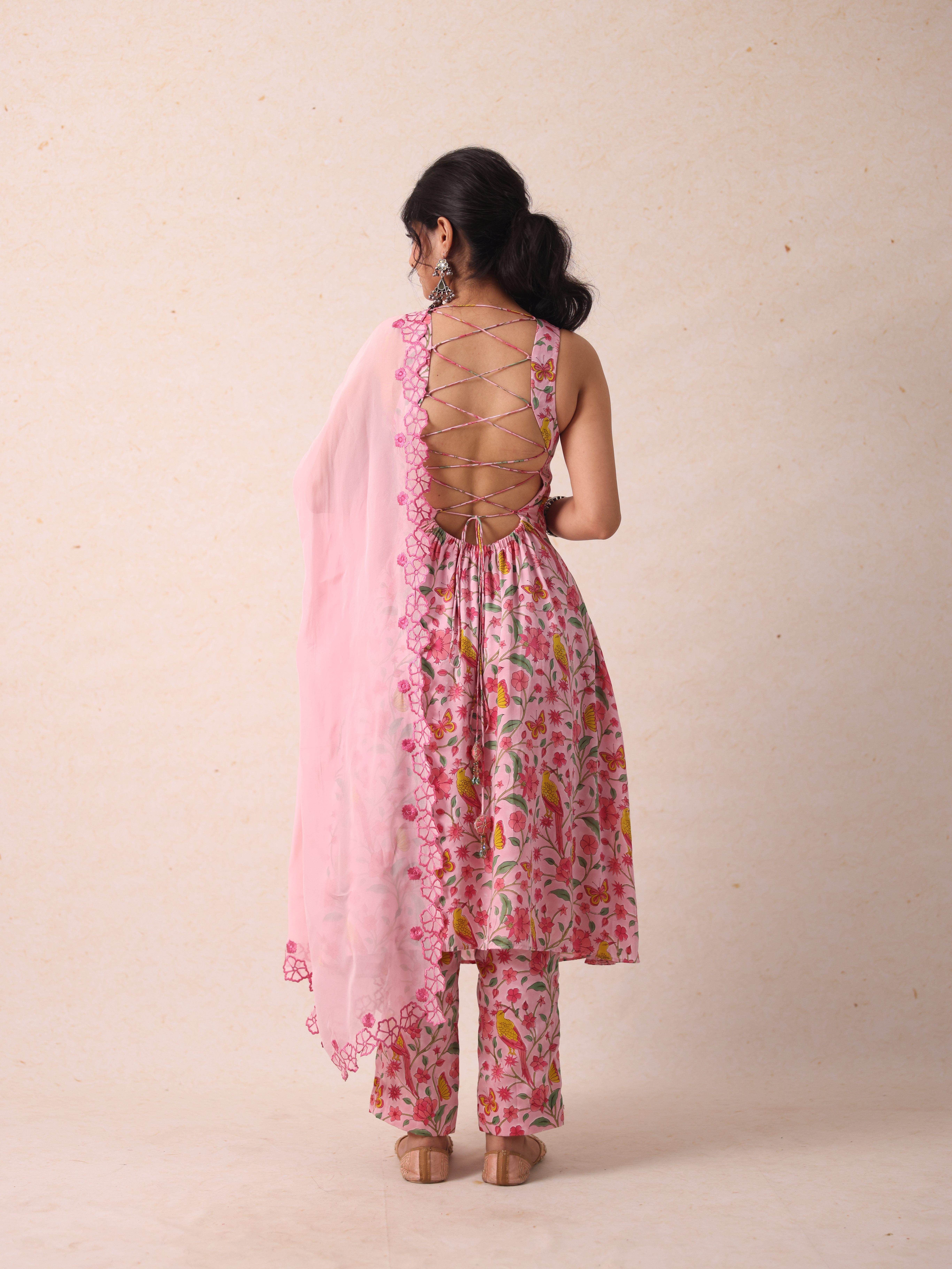 A model showcasing Shelly Pink Kurta Set by Gaamya from Gaamya's collection