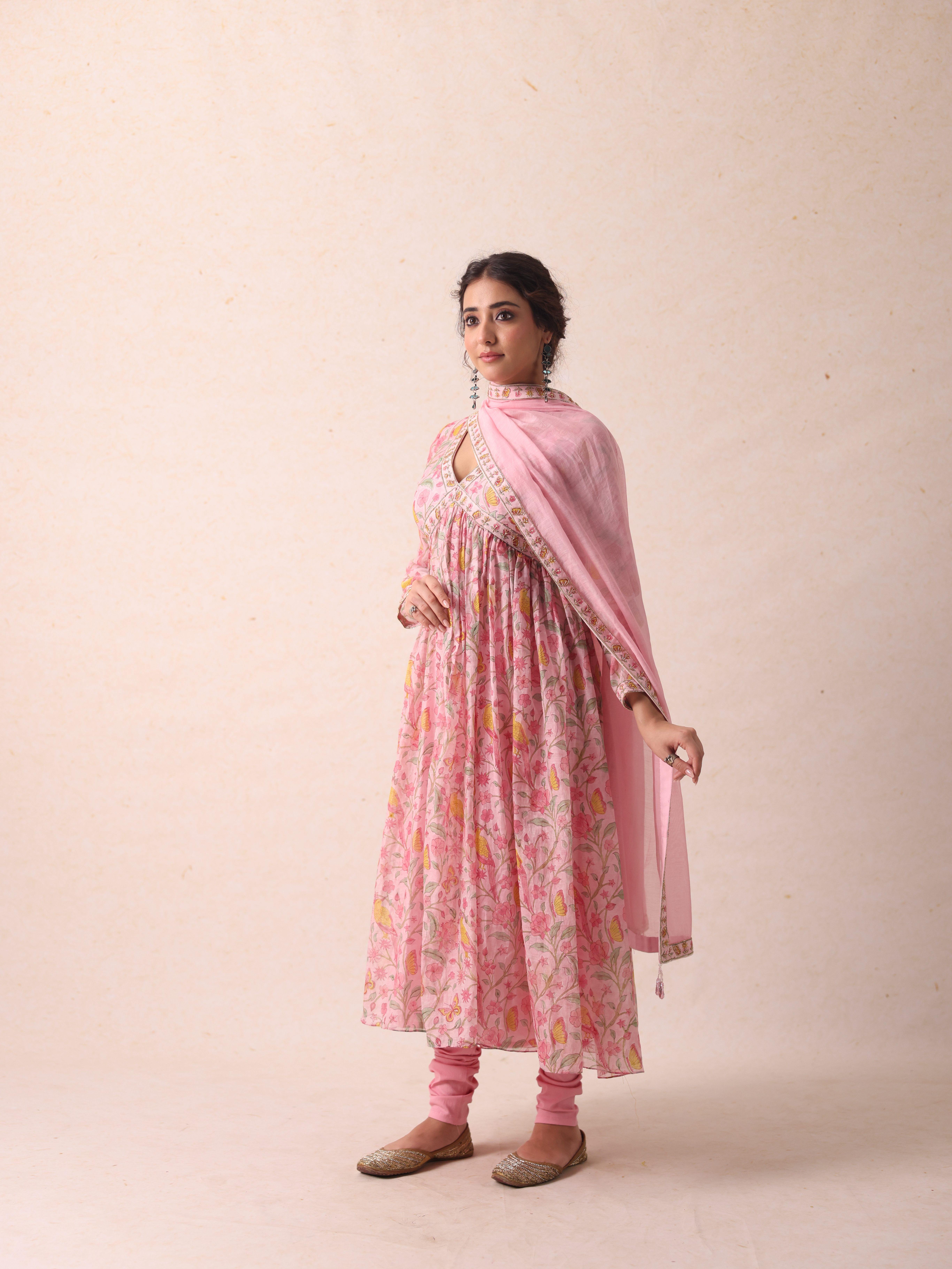 A model showcasing Saanvi Pink Anarkali by Gaamya from Gaamya's collection