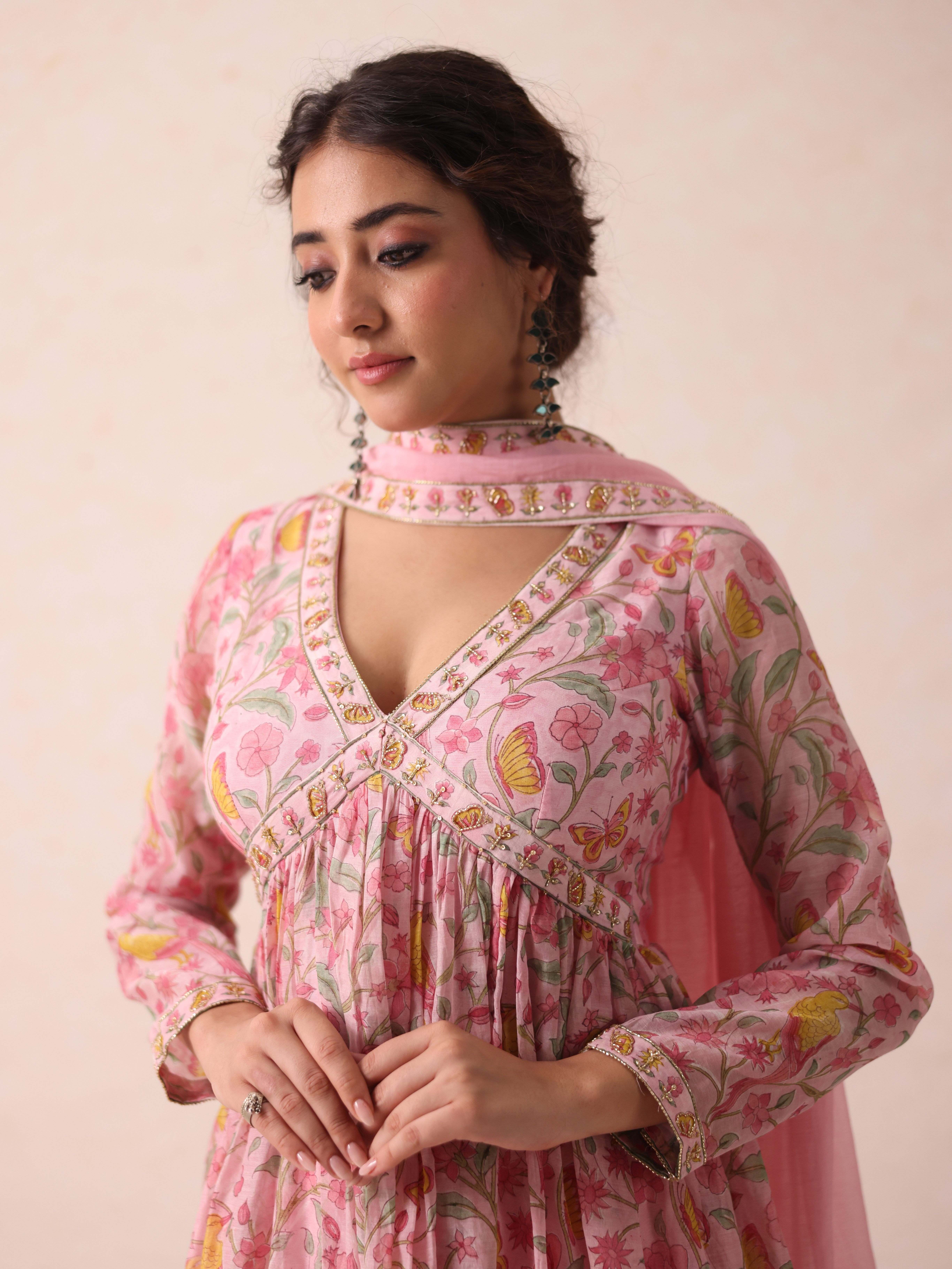 A model showcasing Saanvi Pink Anarkali by Gaamya from Gaamya's collection