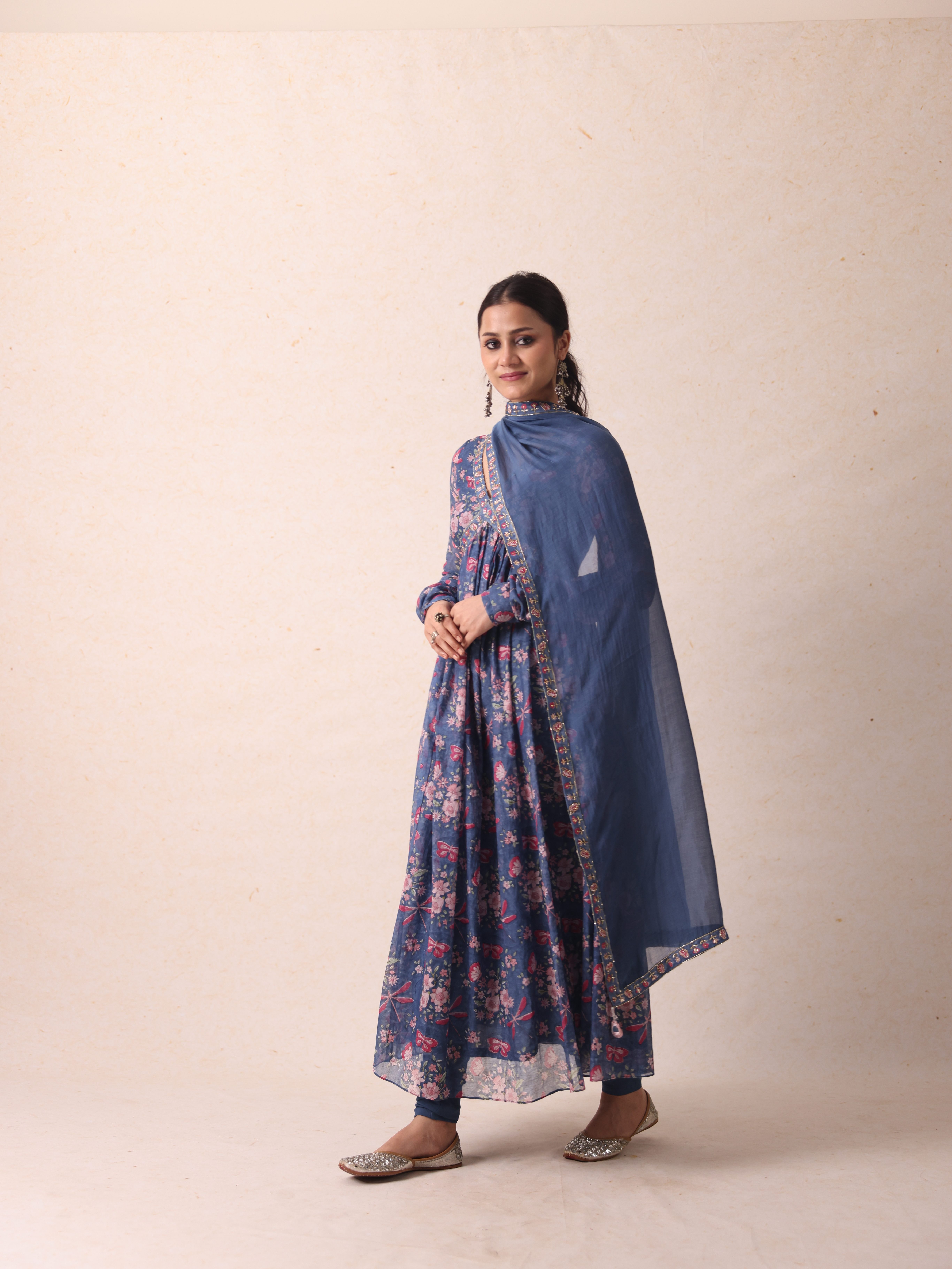 A model showcasing Shloka Blue Anarkali by Gaamya from Gaamya's collection