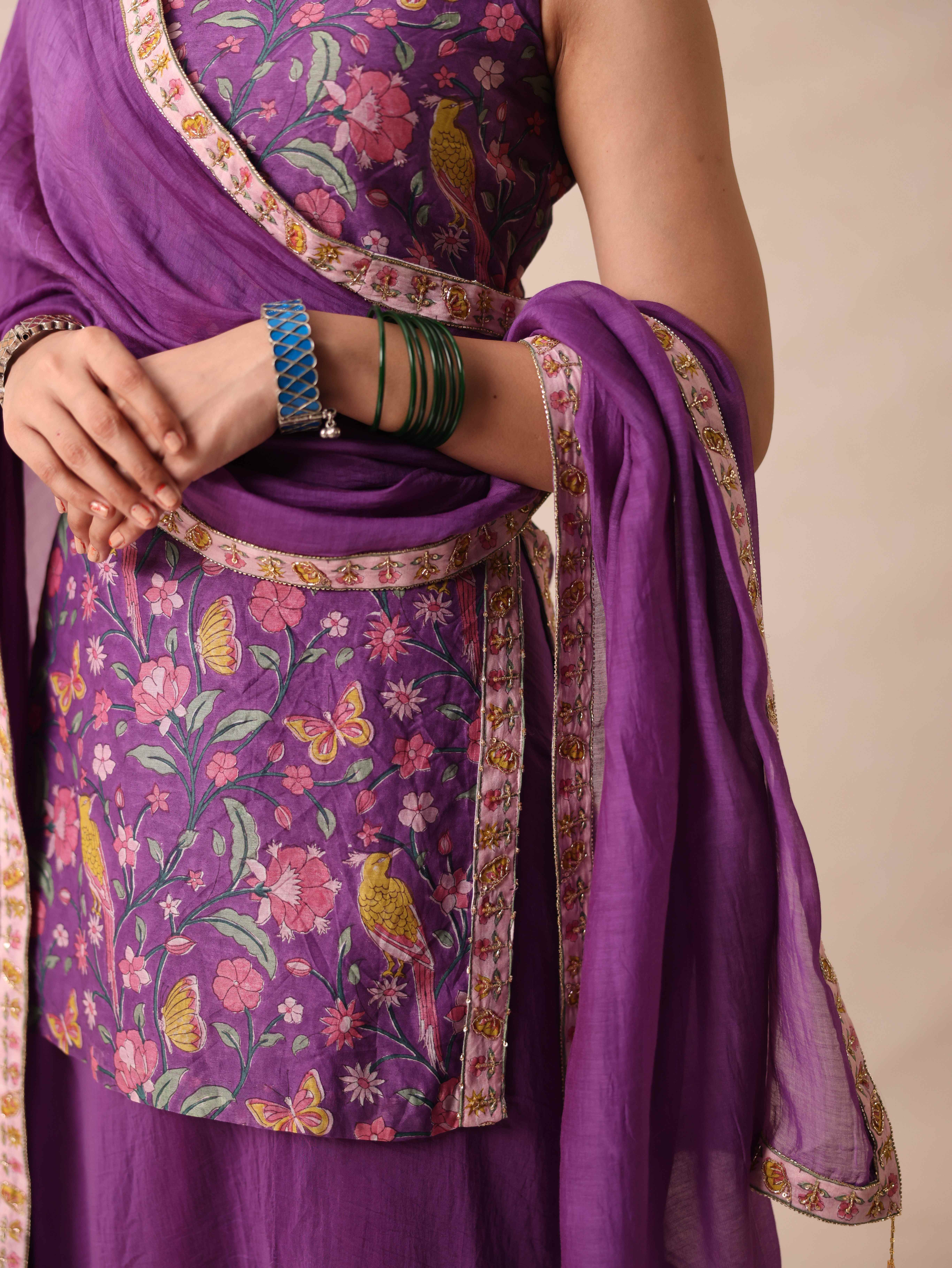 A model showcasing Aashi Violet Set by Gaamya from Gaamya's collection