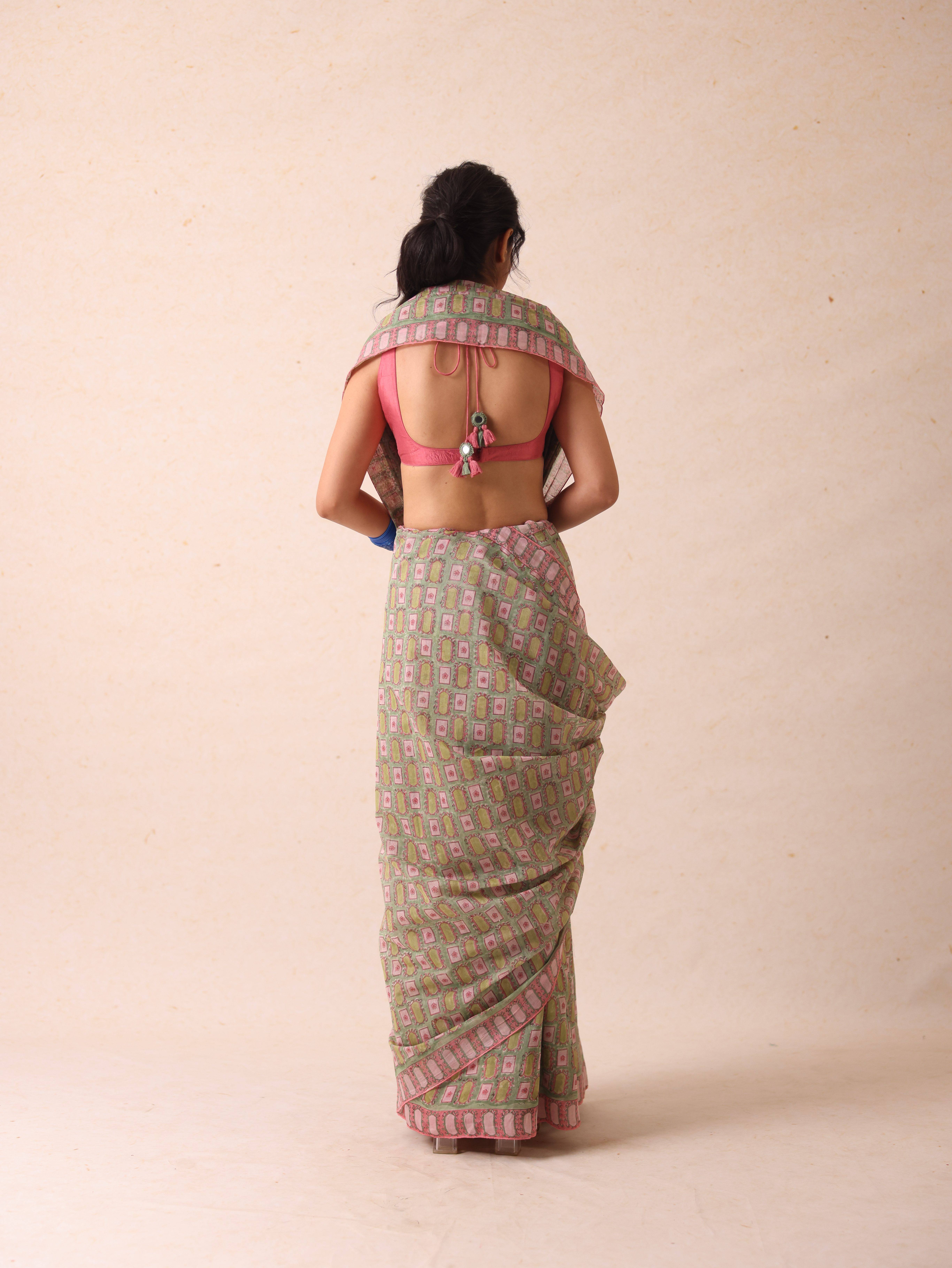 A model showcasing Divya Pistachio Saree by Gaamya from Gaamya's collection