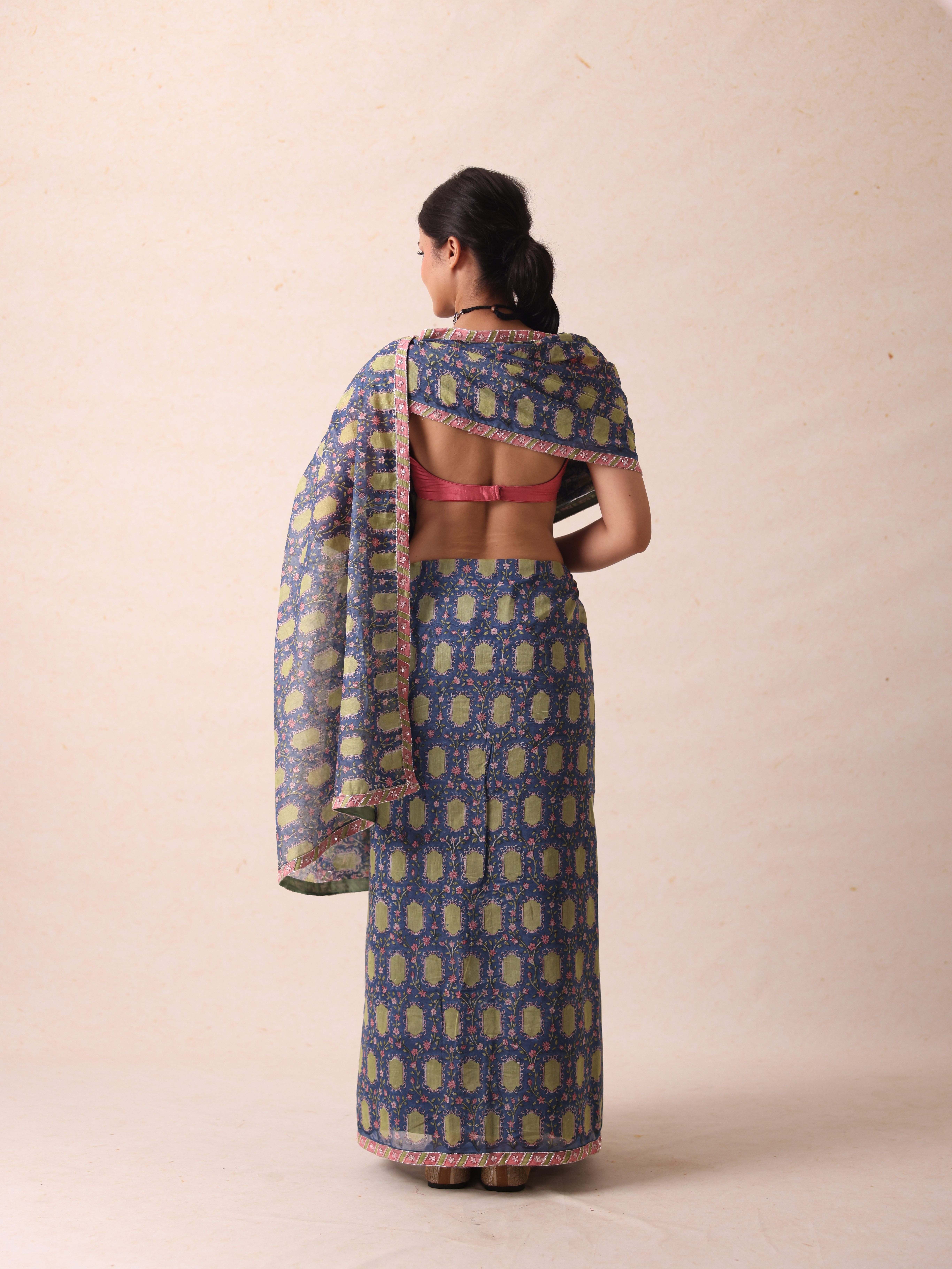 A model showcasing Tanya Blue Saree by Gaamya from Gaamya's collection