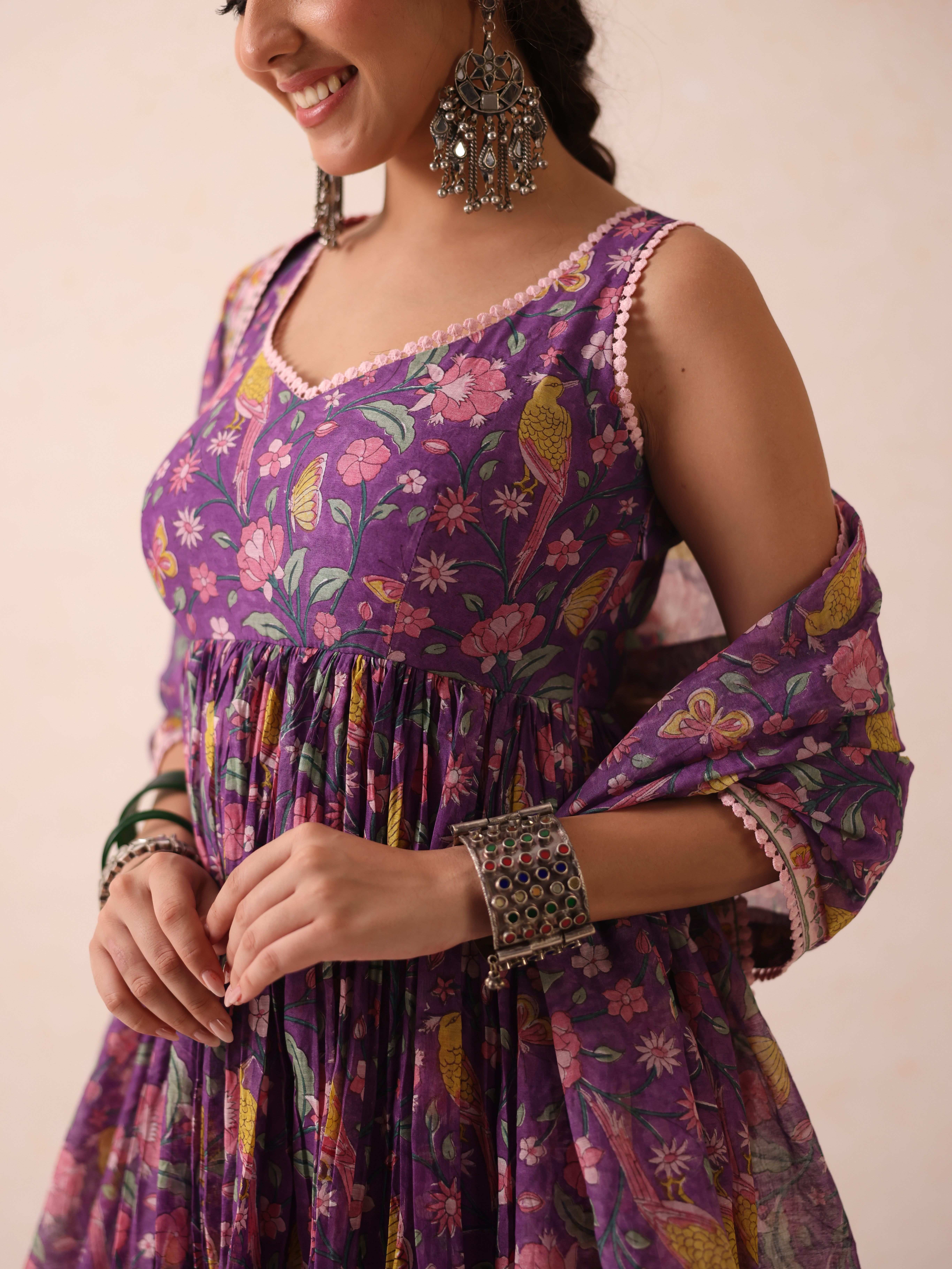 A model showcasing Khushi Purple Anarkali by Gaamya from Gaamya's collection