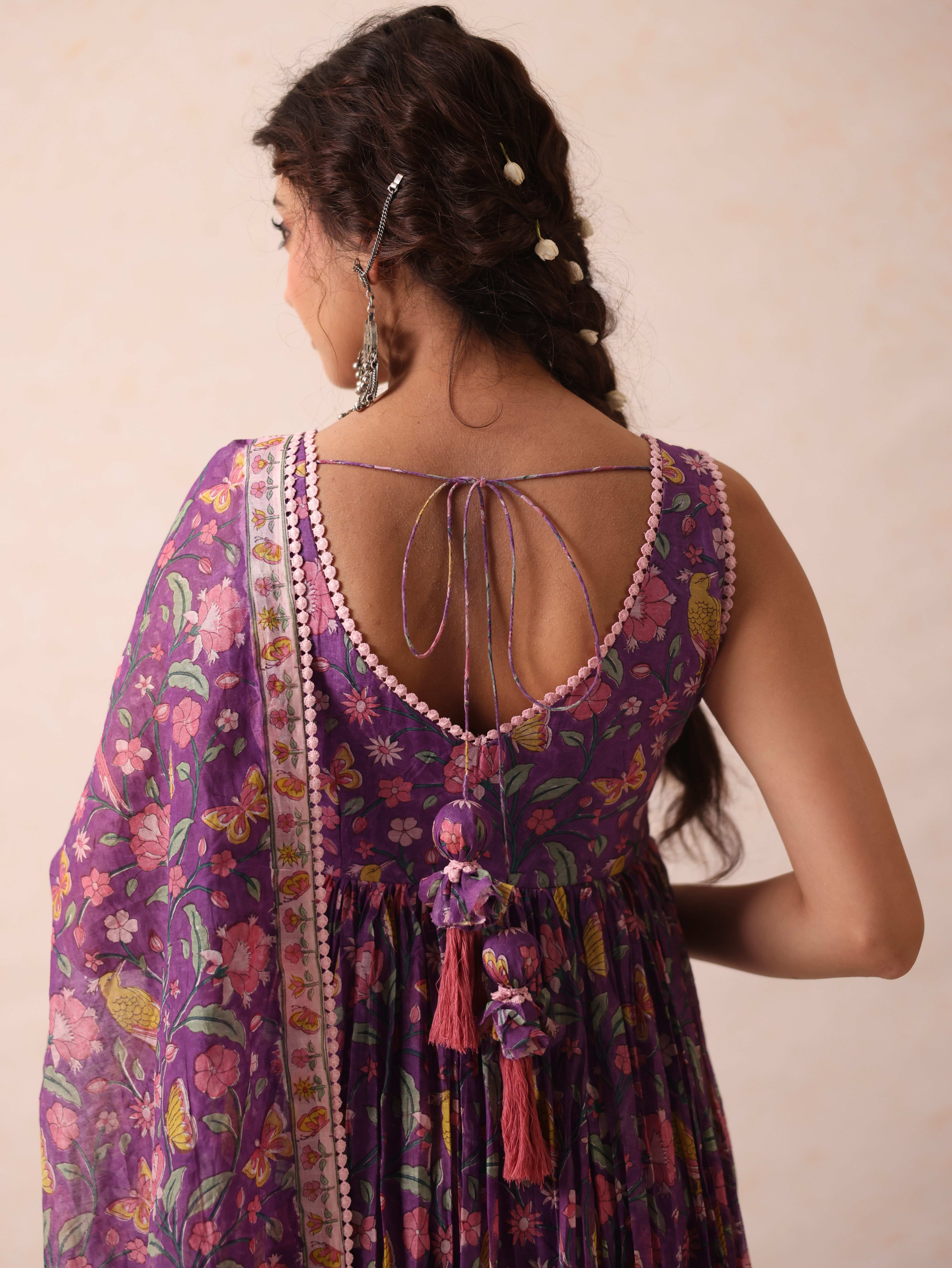 A model showcasing Khushi Purple Anarkali by Gaamya from Gaamya's collection