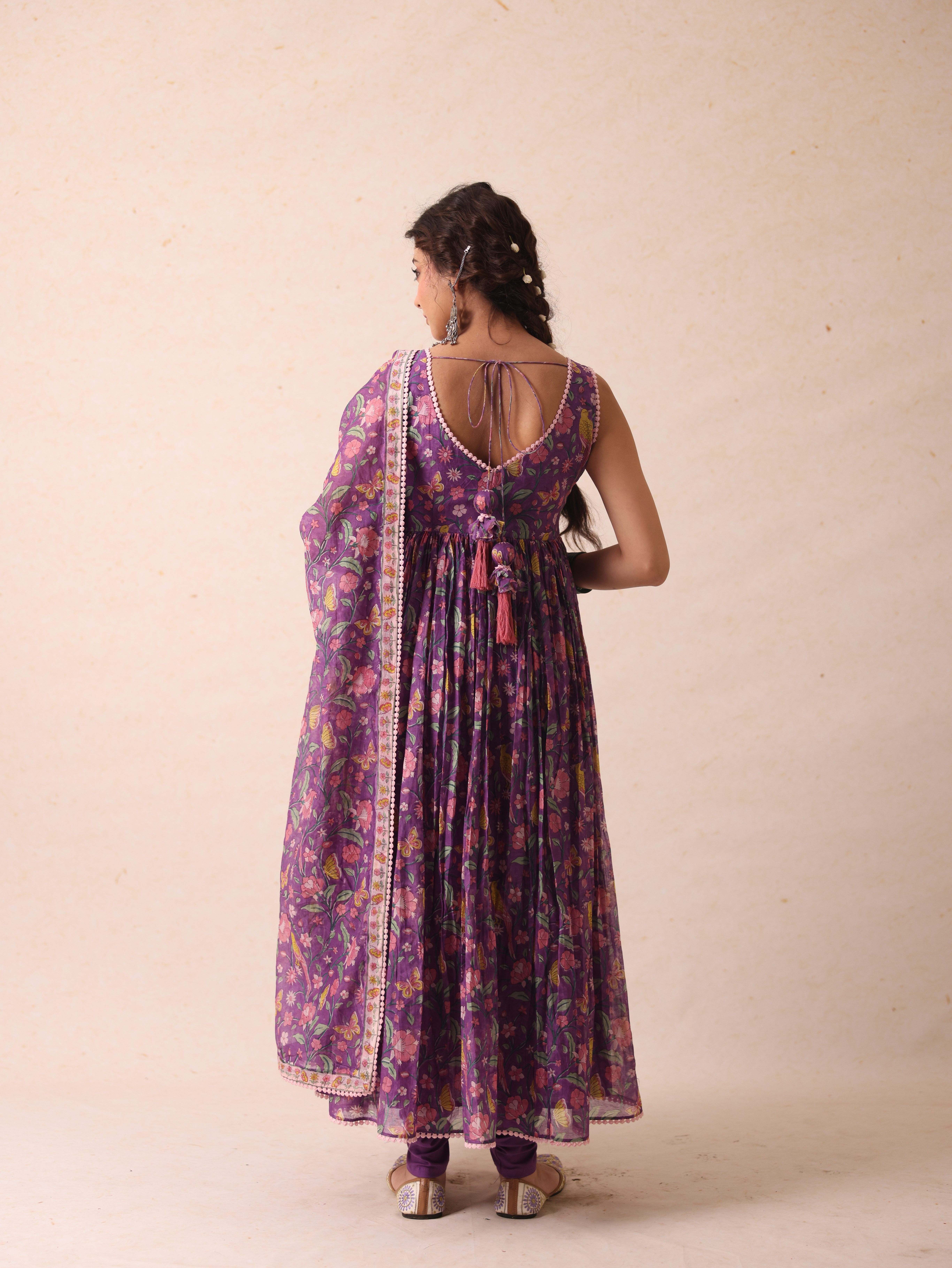 A model showcasing Khushi Purple Anarkali by Gaamya from Gaamya's collection