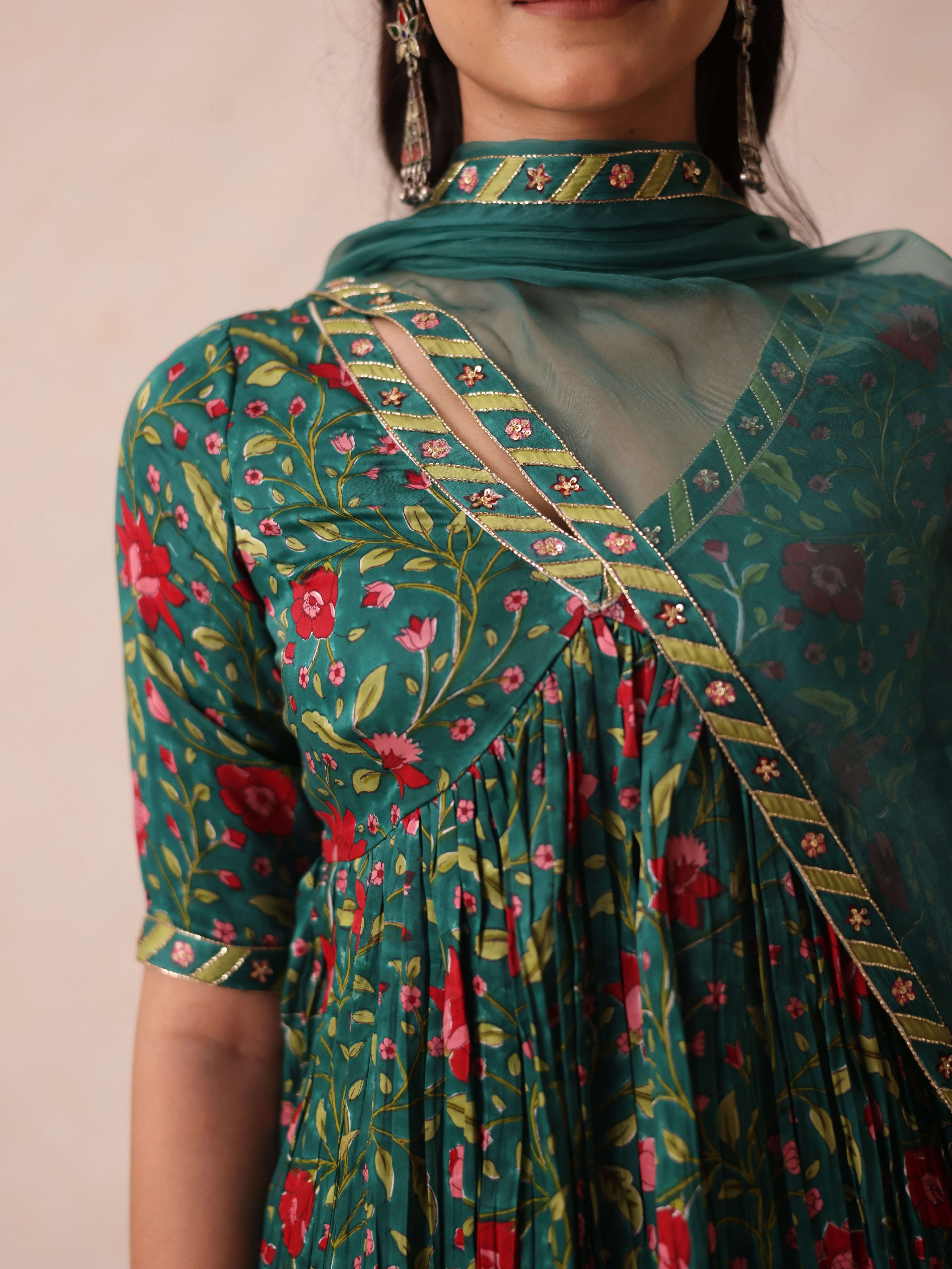 A model showcasing Sonia Green Sharara by Gaamya from Gaamya's collection A model showcasing Sonia Green Sharara by Gaamya from Gaamya's collection