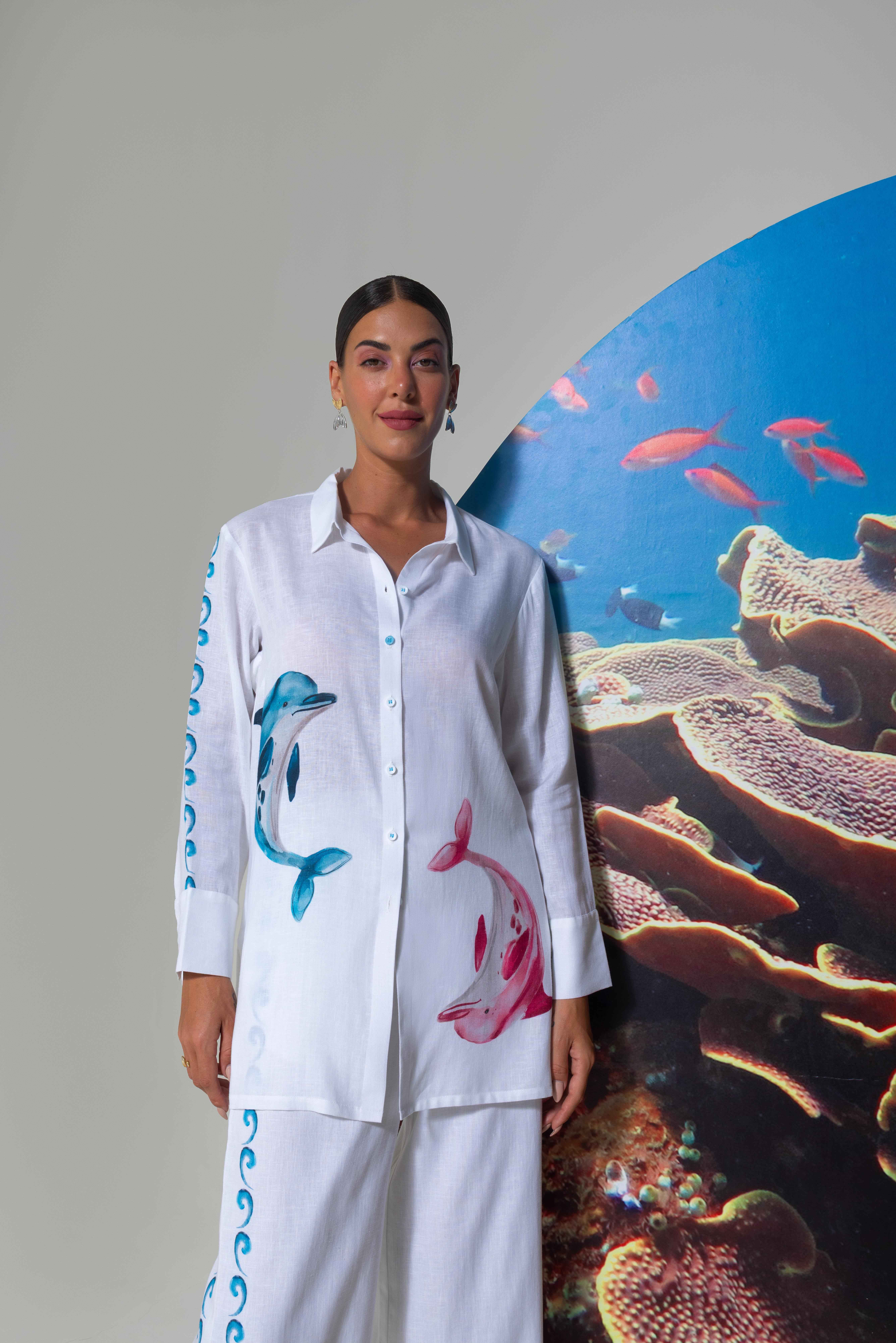 A model showcasing White Vacation Wear Top And Pants by Nautanky from Nautanky's collection