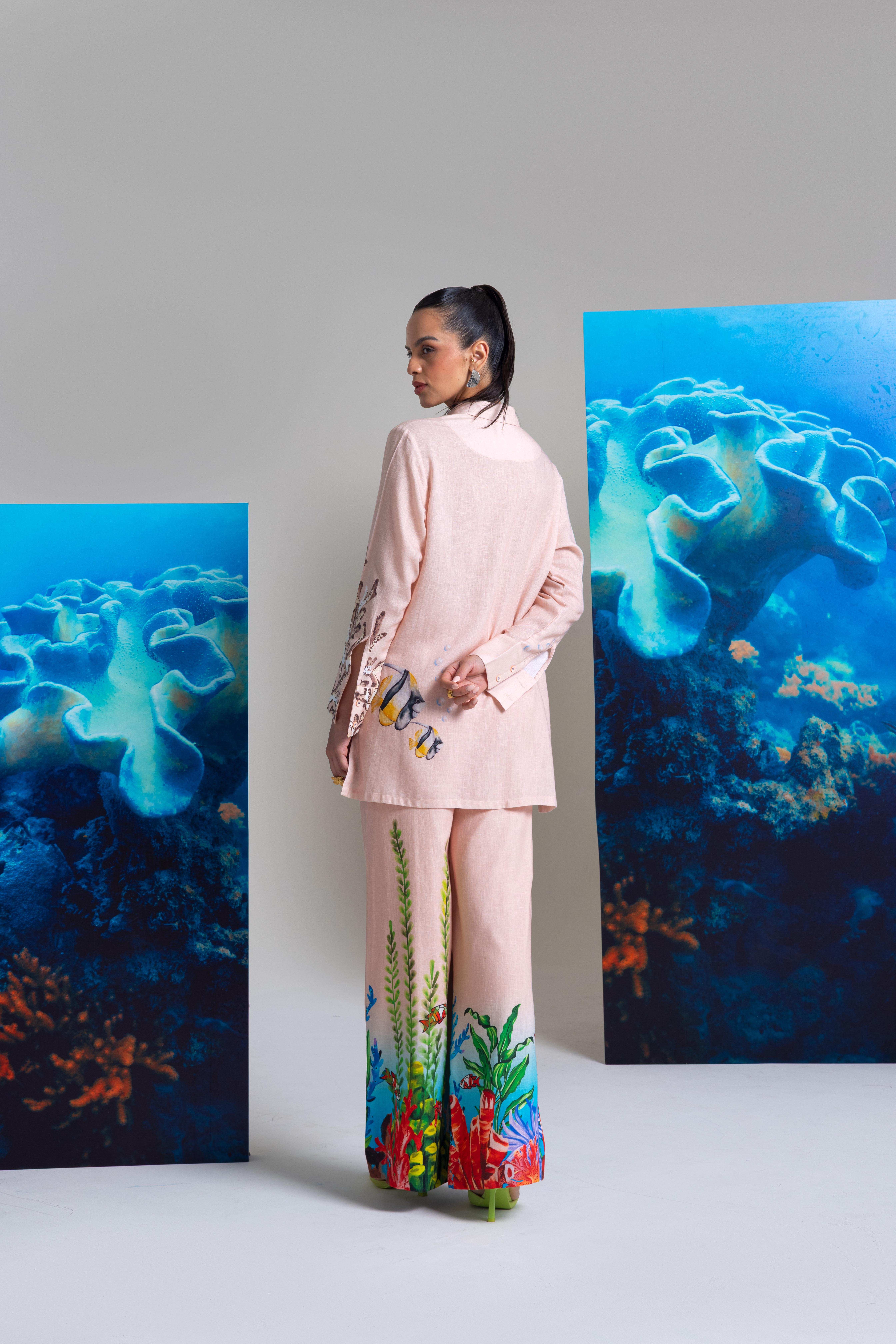 A model showcasing Baby Pink Cotton Linen Top And Bell Bottom by Nautanky from Nautanky's collection