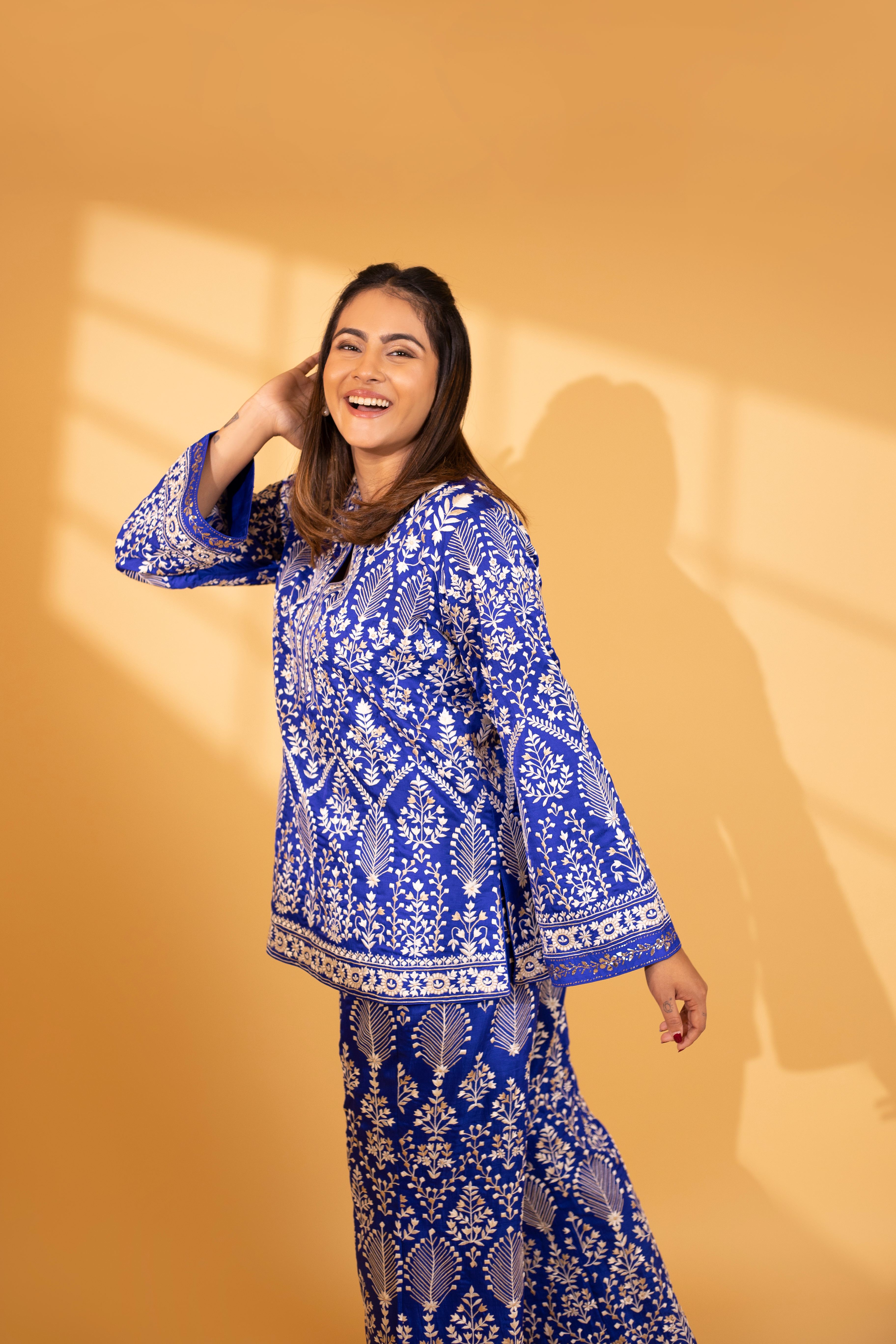 A model showcasing Celeste Regal Blue Silk Kurta And Pants by Ashtar from Ashtar's collection