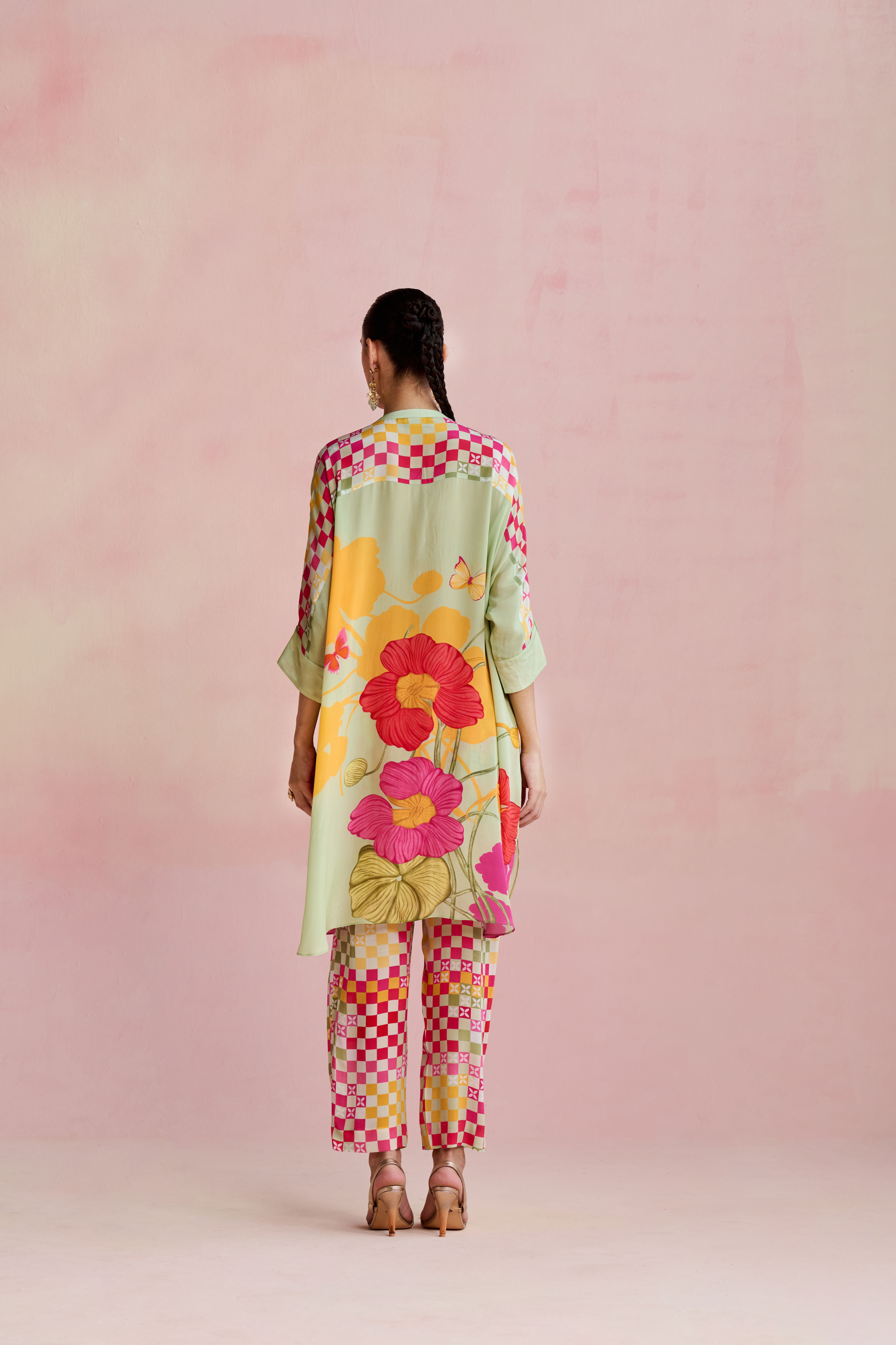 A model showcasing Suri Multi Kurta Set by Nirvair from Nirvair's collection