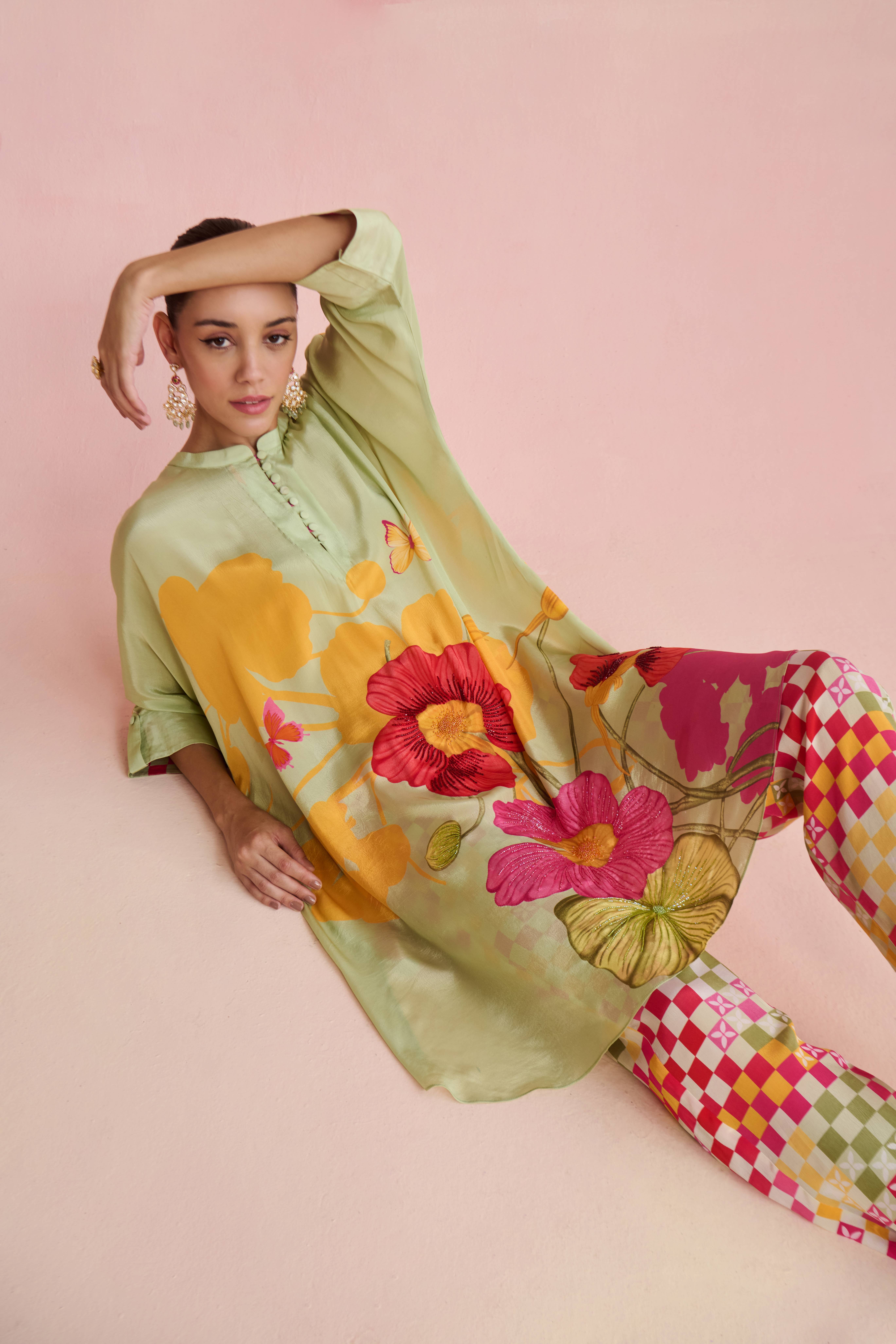 A model showcasing Suri Multi Kurta Set by Nirvair from Nirvair's collection